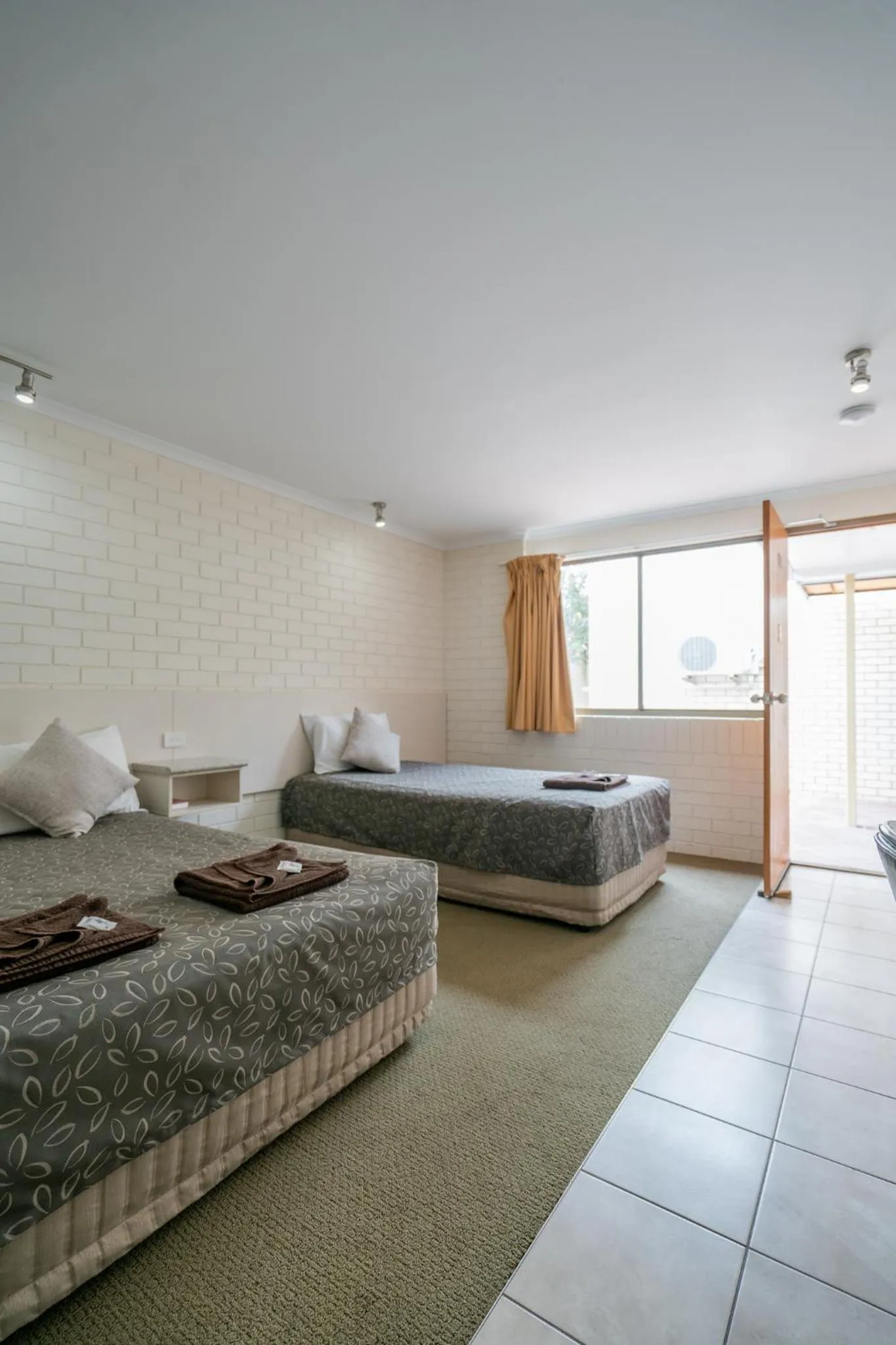 Bed in Capella Hotel Motel