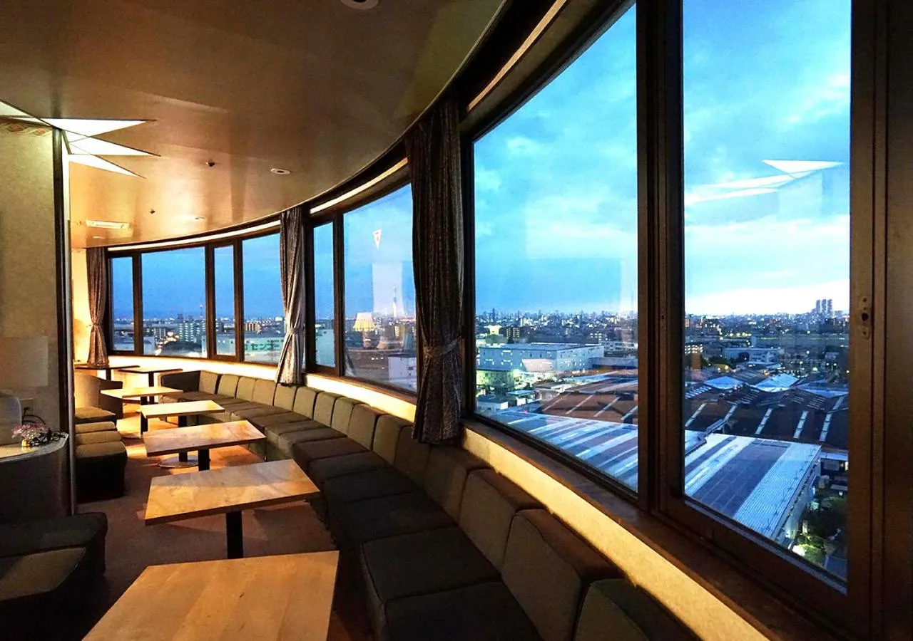 Communal lounge/ TV room in Neyagawa Trend Hotel