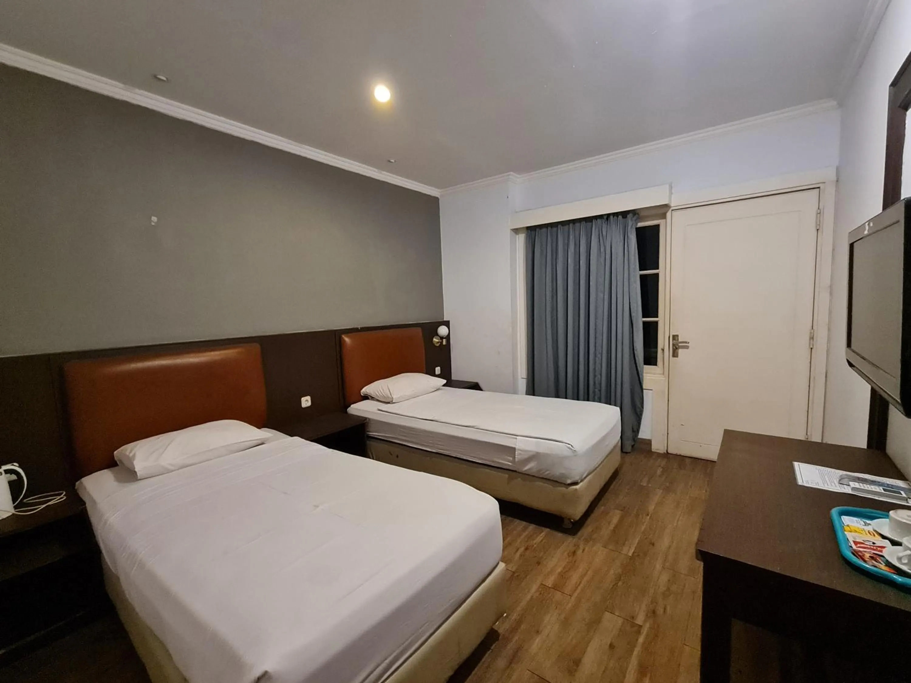 Bed in Hotel Minahasa Manado