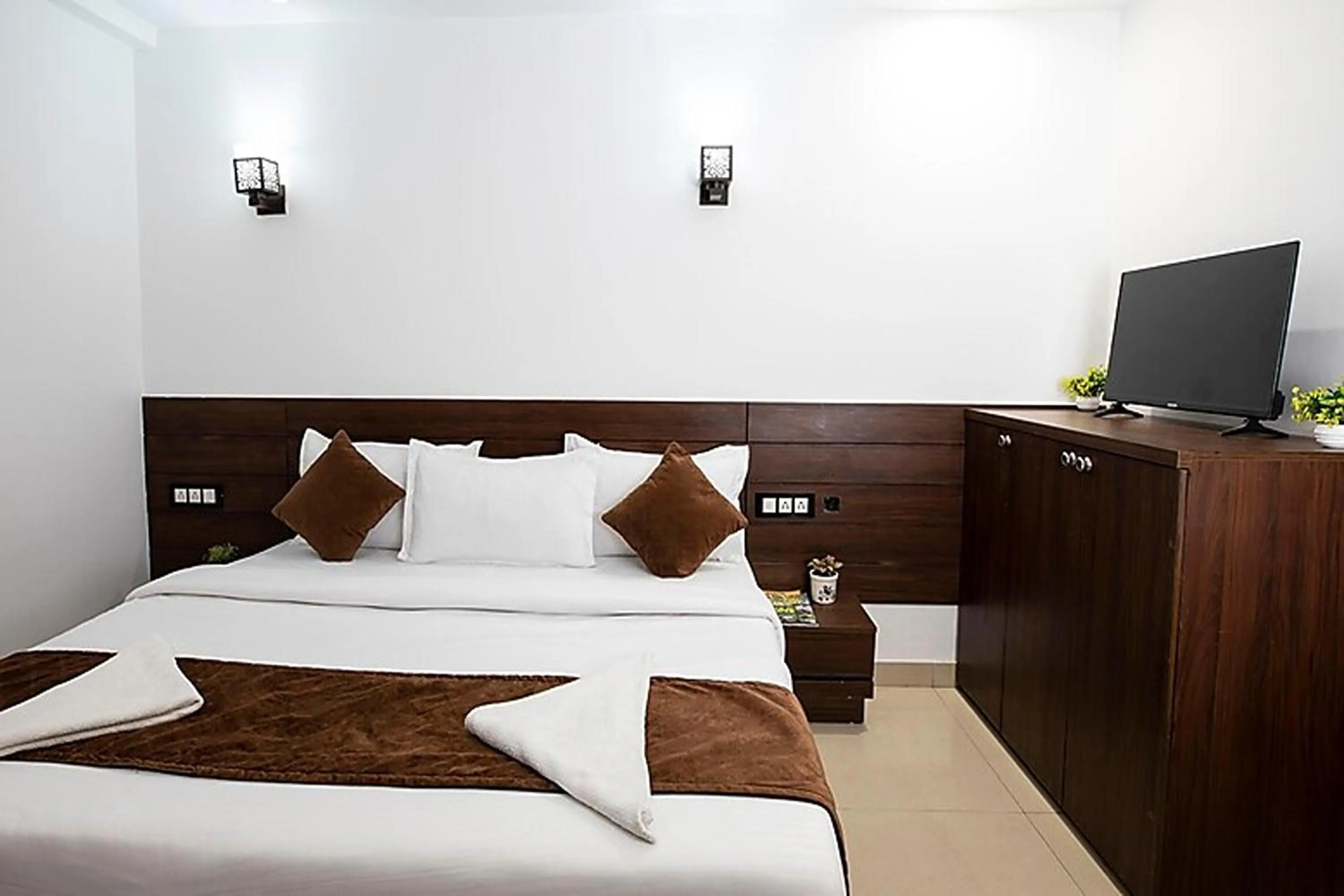 Bed in HR Grand Hotel