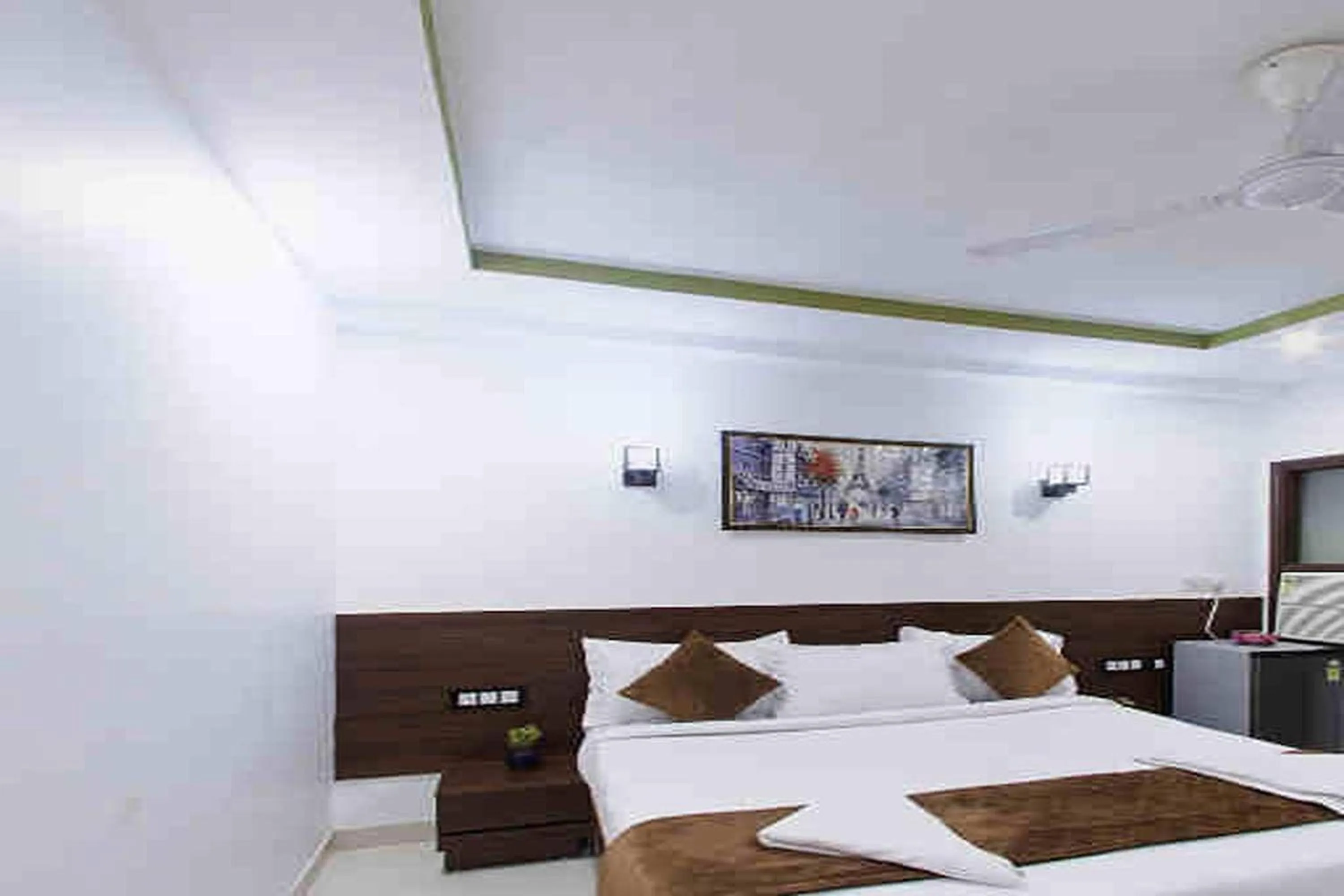 Bed in HR Grand Hotel