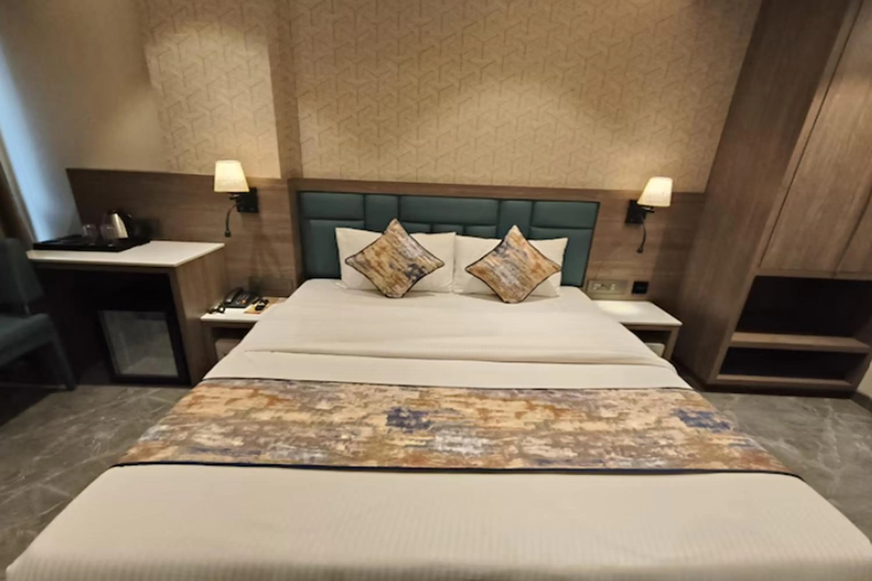 Bed in Dream Residency Hotels Pvt Ltd