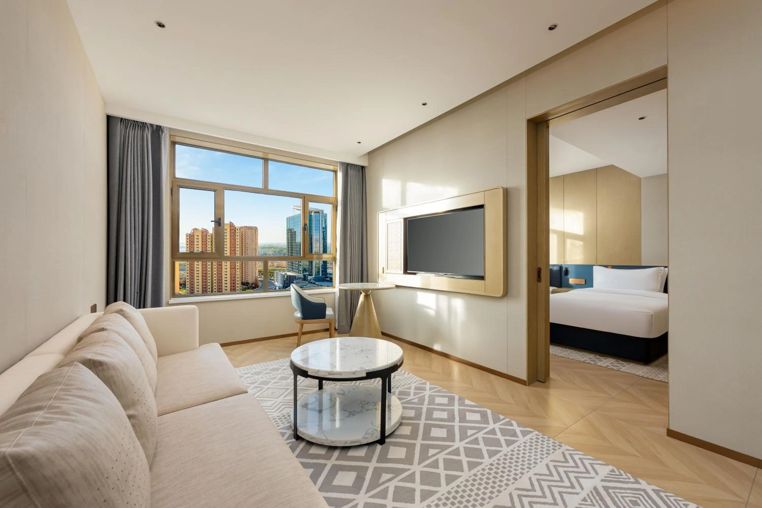 Living room, Bed in Holiday Inn Express Kashgar Downtown by IHG