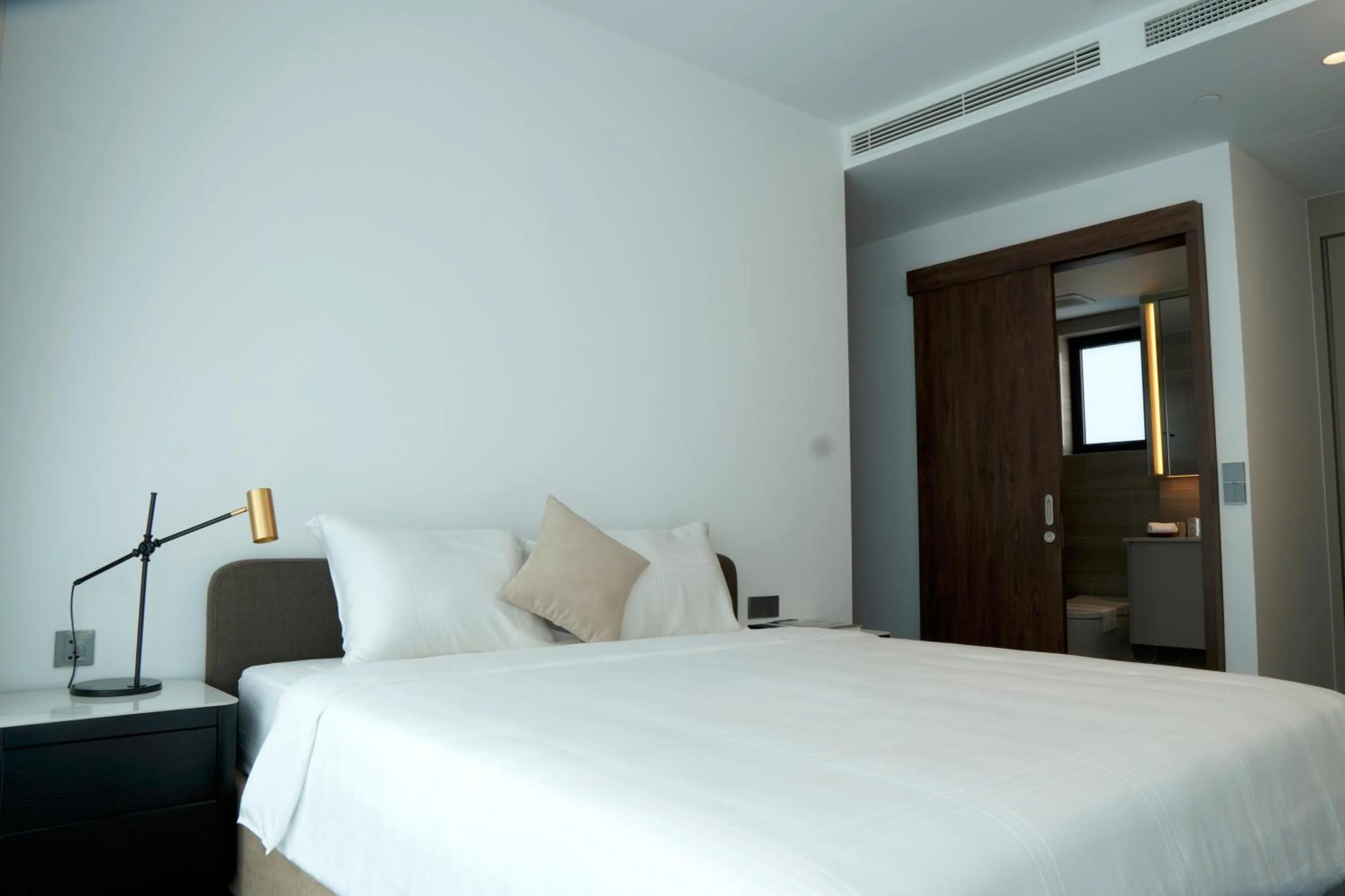 Bed in Lancaster Legacy Hotel & Apartments