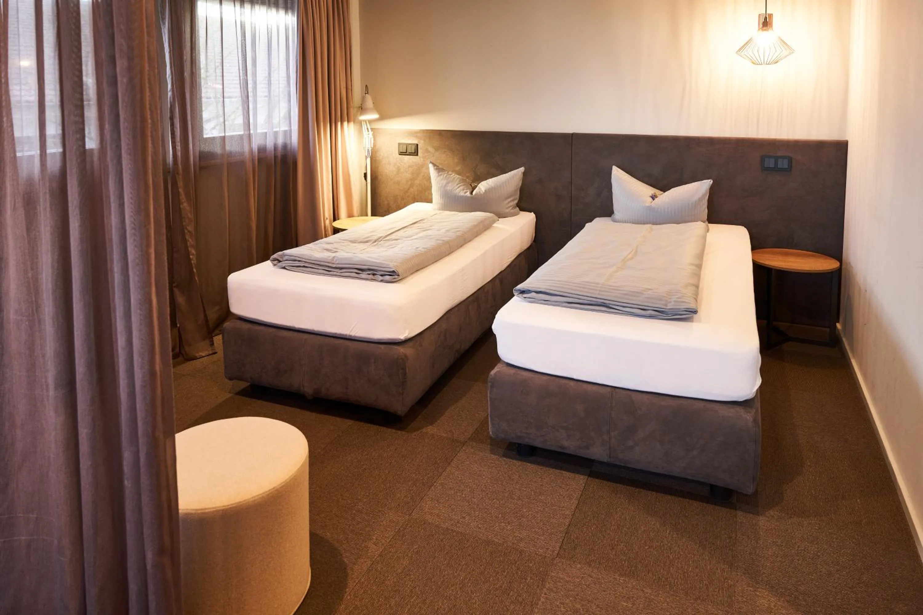 Photo of the whole room, Bed in ARRIVEL Hotel Kirchheim - bisher Novitel
