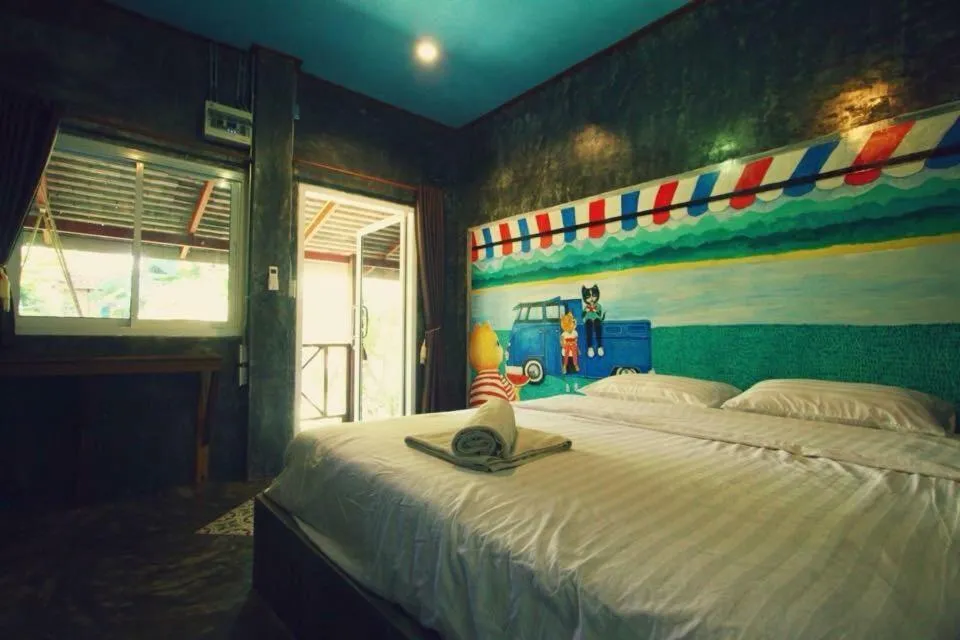 Bed in Sawasdeepai River Resort