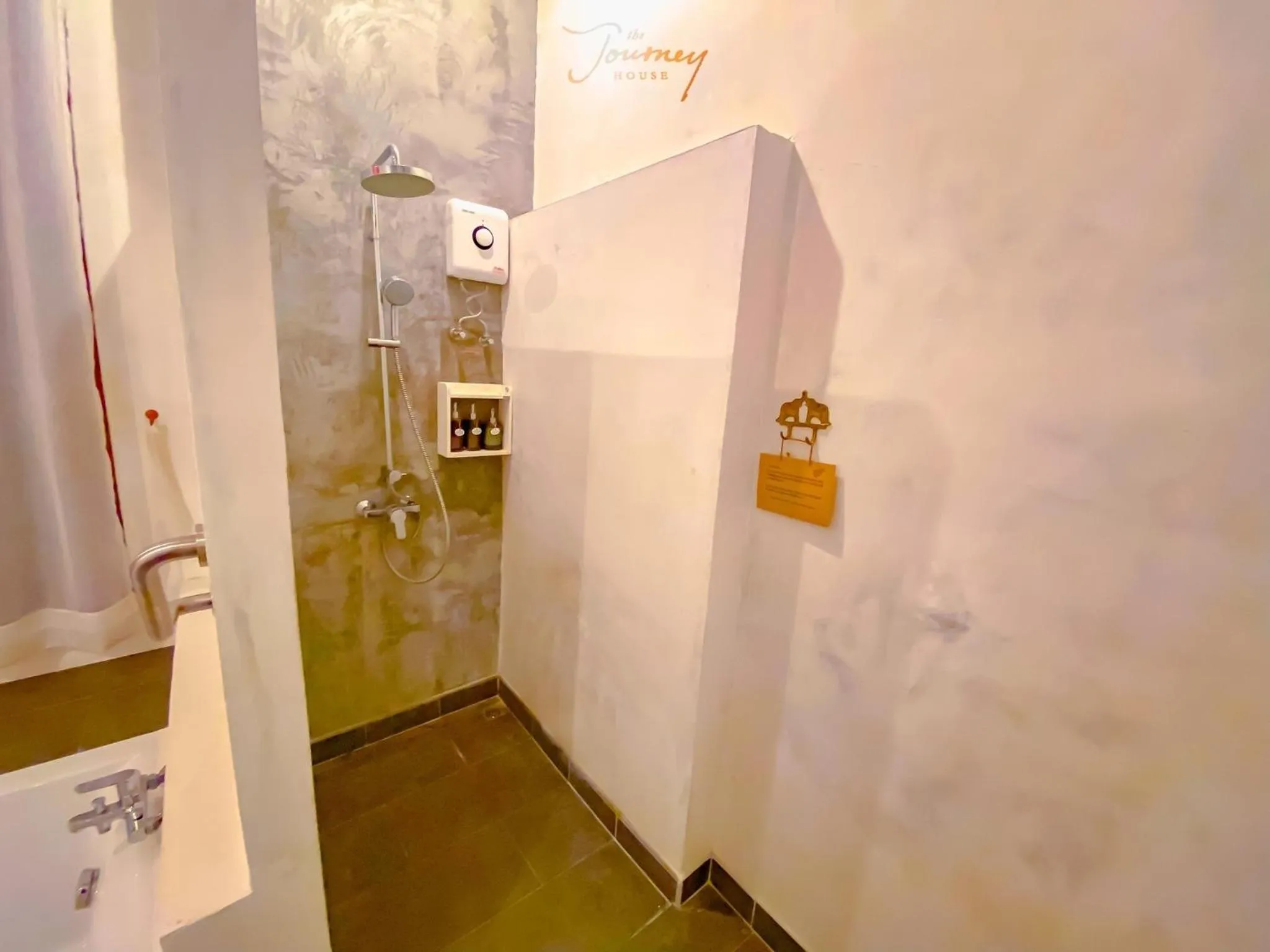 Shower in The Journey House Lifestyle Boutique Hotel