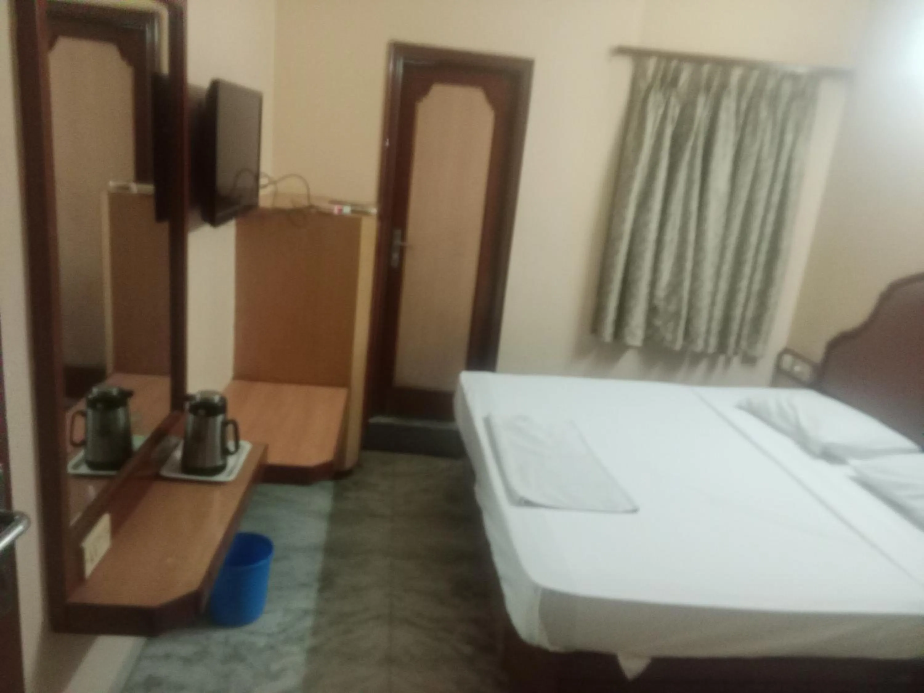 Bed in Hotel Valluvar