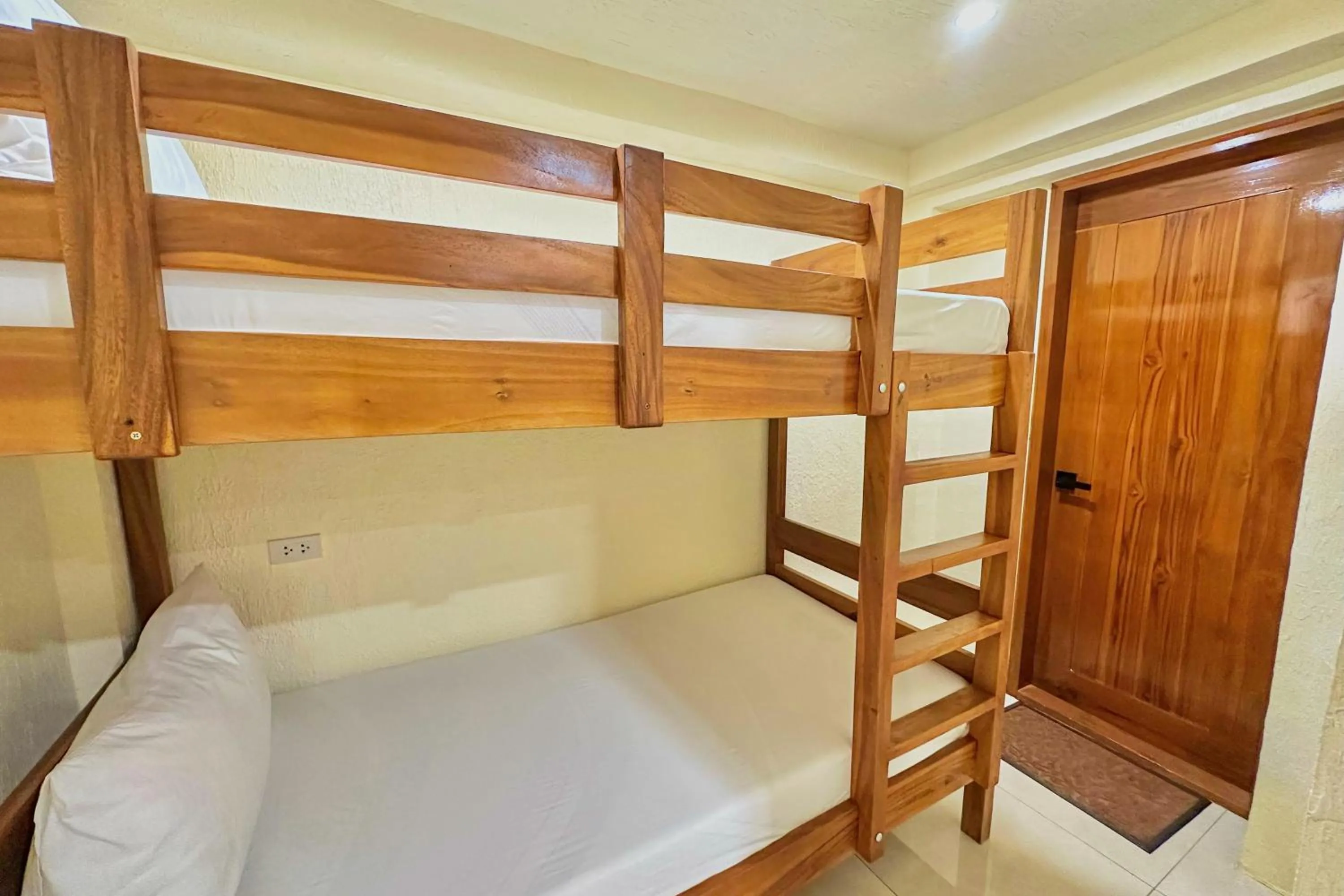 Bed in Mandala Beach Resorts powered by Cocotel