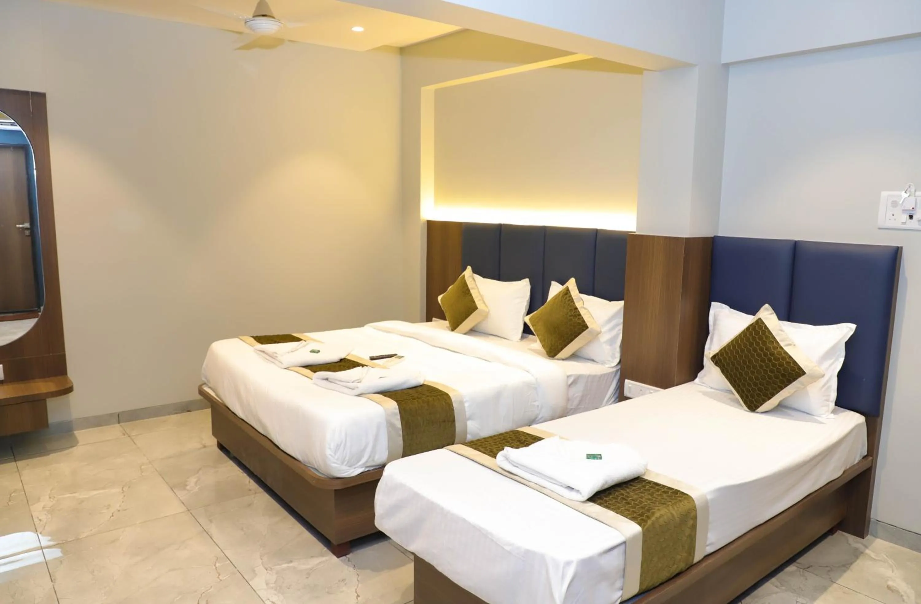 Triple Room in RK Hotel