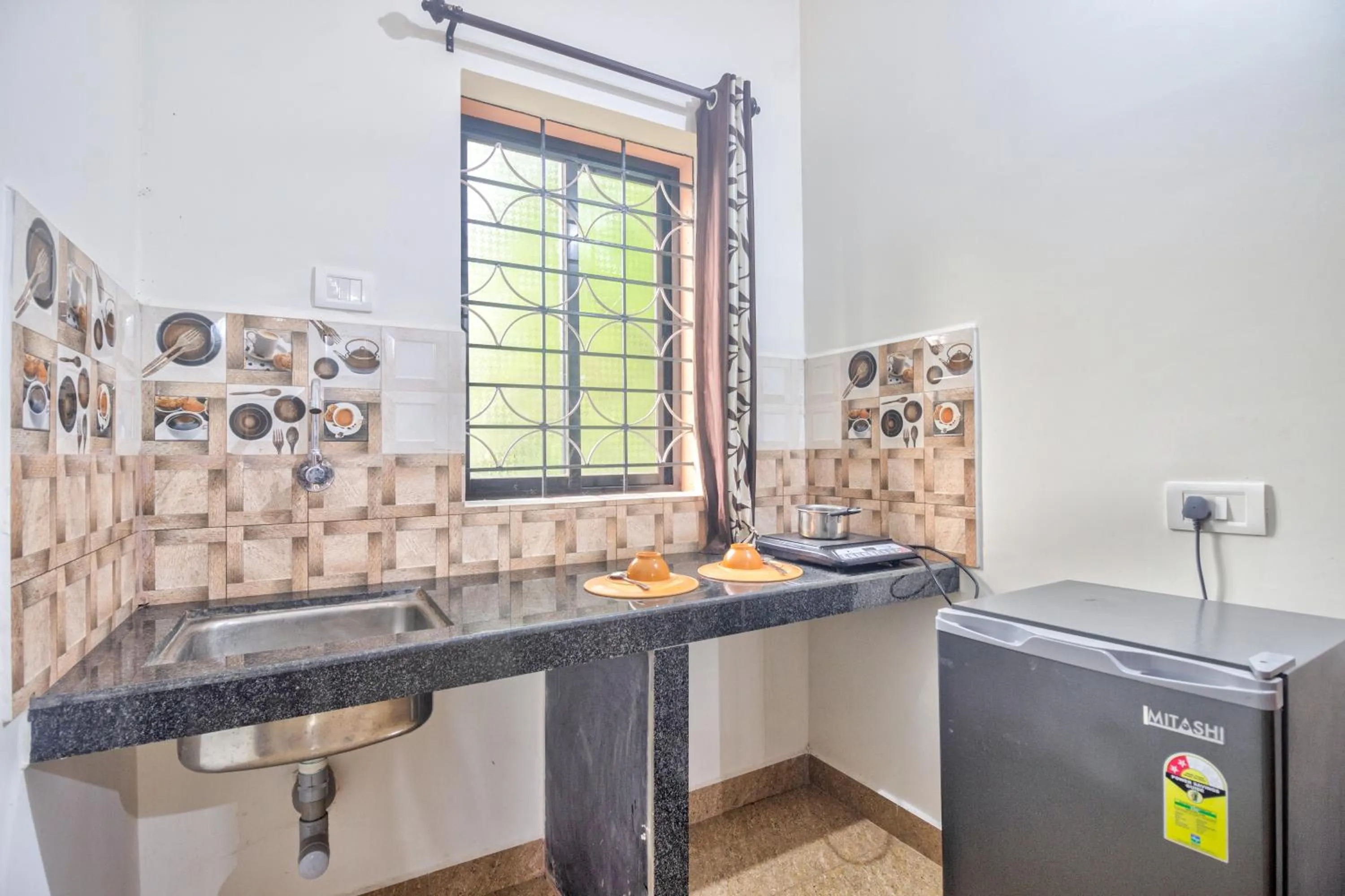 Kitchen or kitchenette in Hotel Calangute bay