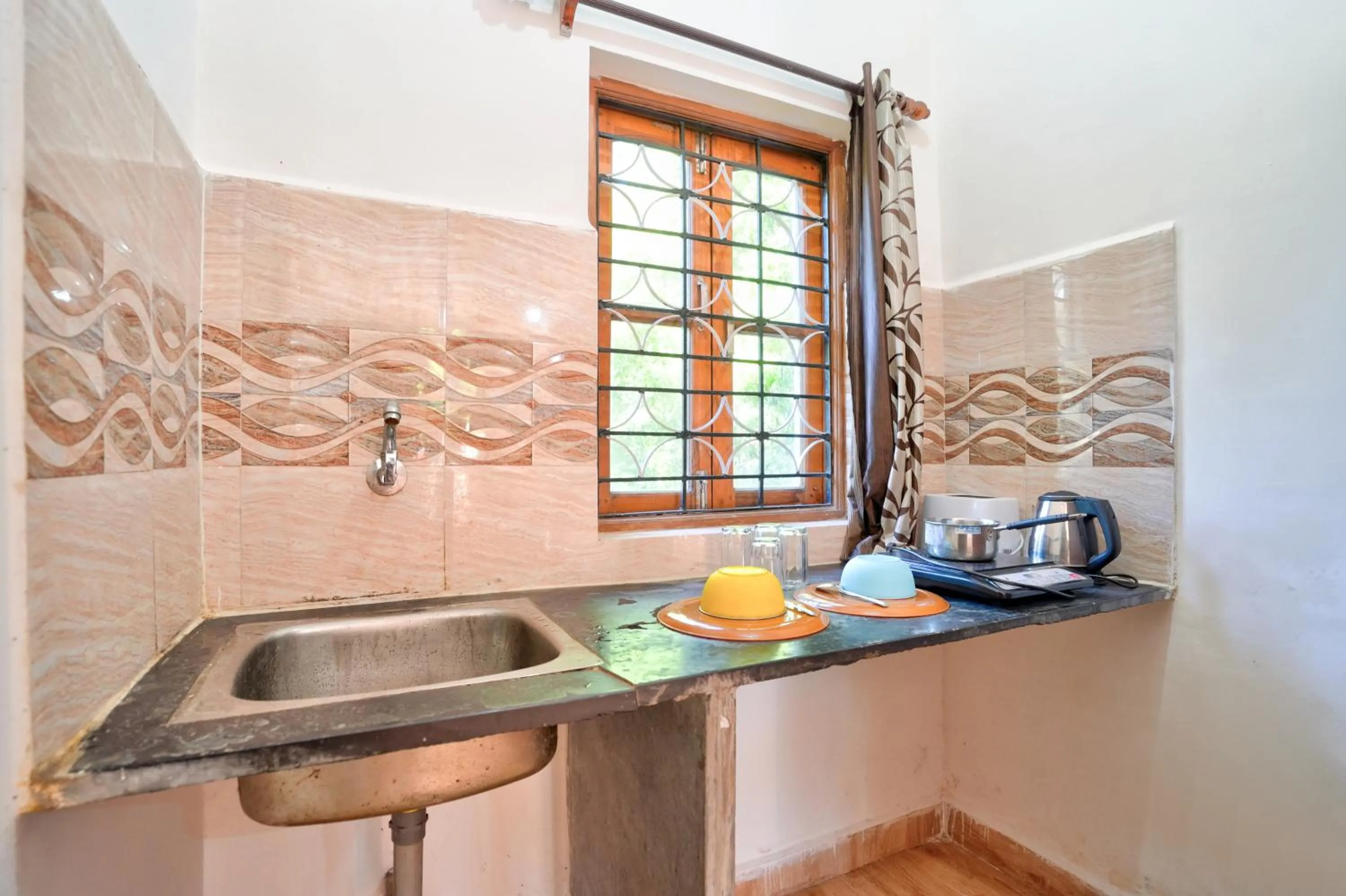 Kitchen or kitchenette in Hotel Calangute bay