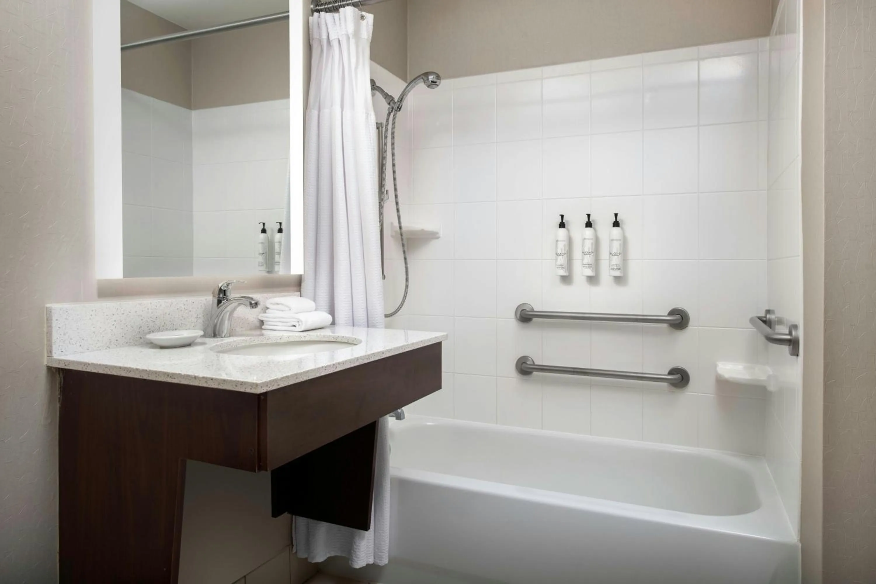 Bathroom in SpringHill Suites by Marriott Orlando at FLAMINGO CROSSINGS Town Center-Western Entrance