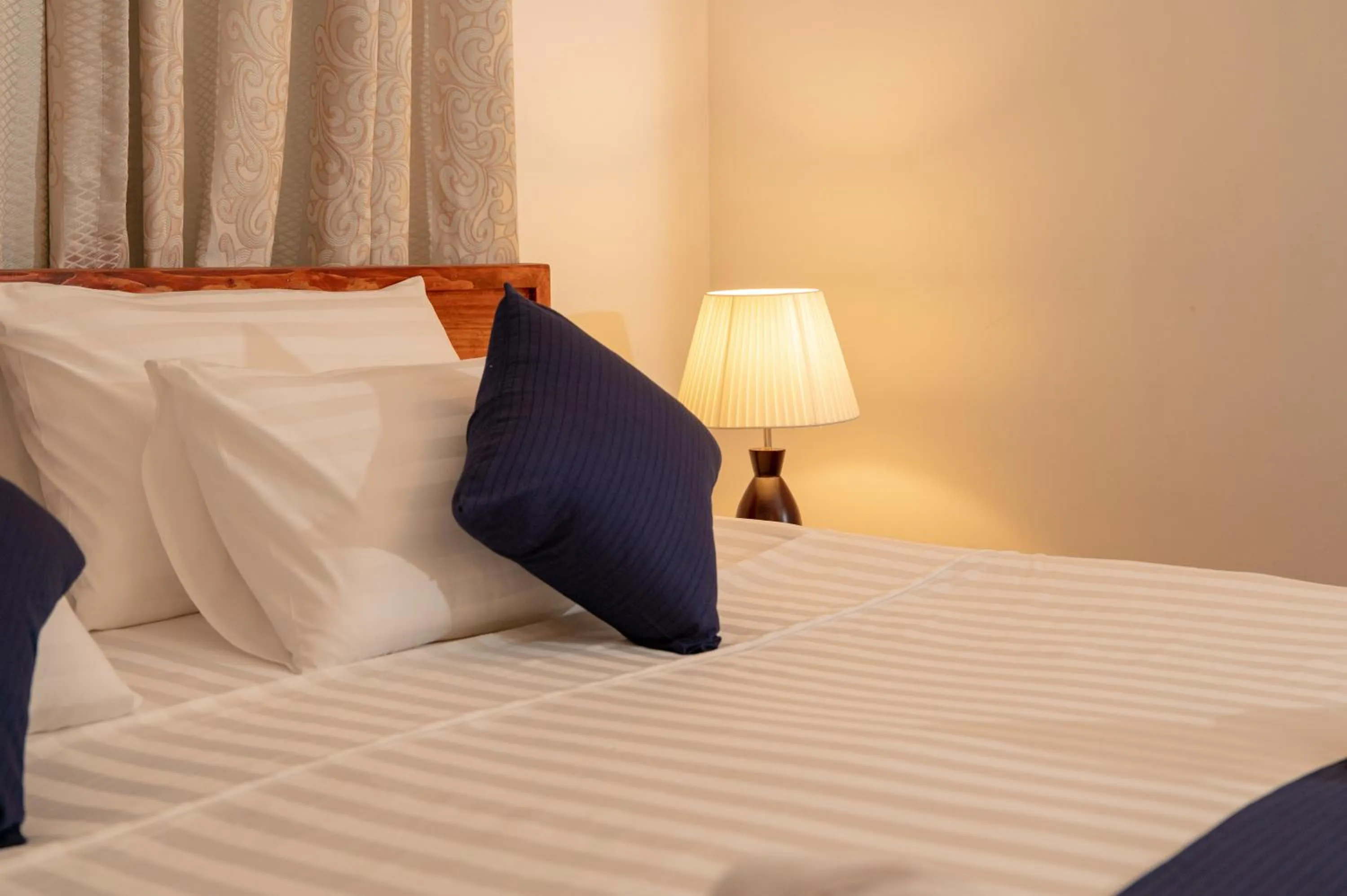 Bedroom, Bed in Biosphere Inn