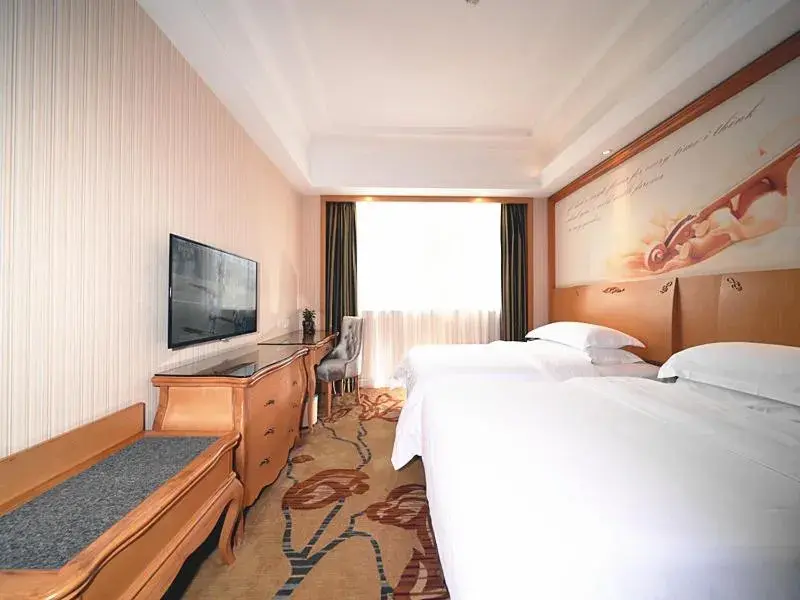 Bed in Vienna Hotel Shenzhen Nanxin Road