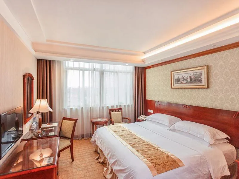 Bed in Vienna Hotel Dongguan Songshan Lake