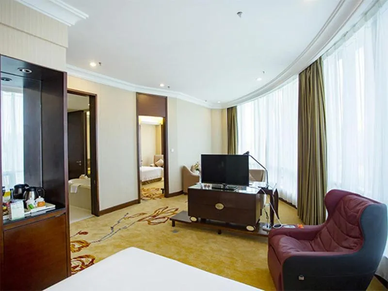 Bed in Vienna International Hotel Shenzhen Hua'nan City