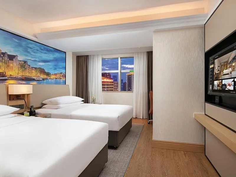 Bed in Vienna International Hotel Changsha Furong Plaza