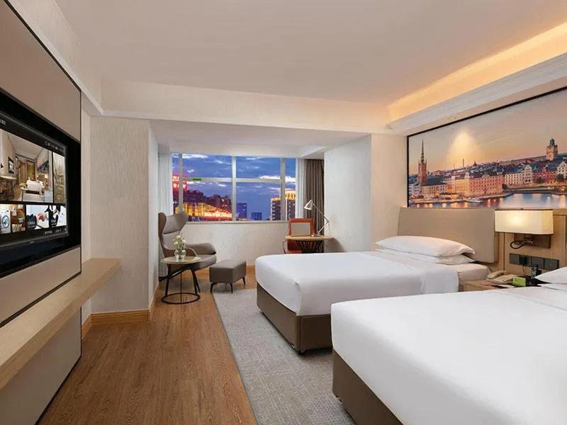 Bed in Vienna International Hotel Changsha Furong Plaza