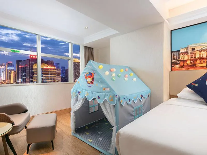 Bed in Vienna International Hotel Changsha Furong Plaza