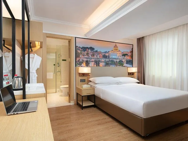 Bed in Vienna International Hotel Changsha Furong Plaza