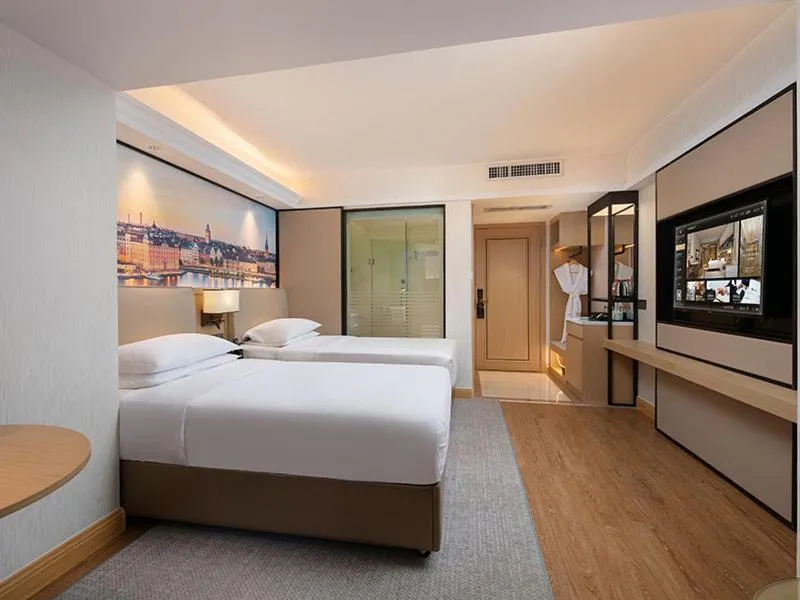 Bed in Vienna International Hotel Changsha Furong Plaza