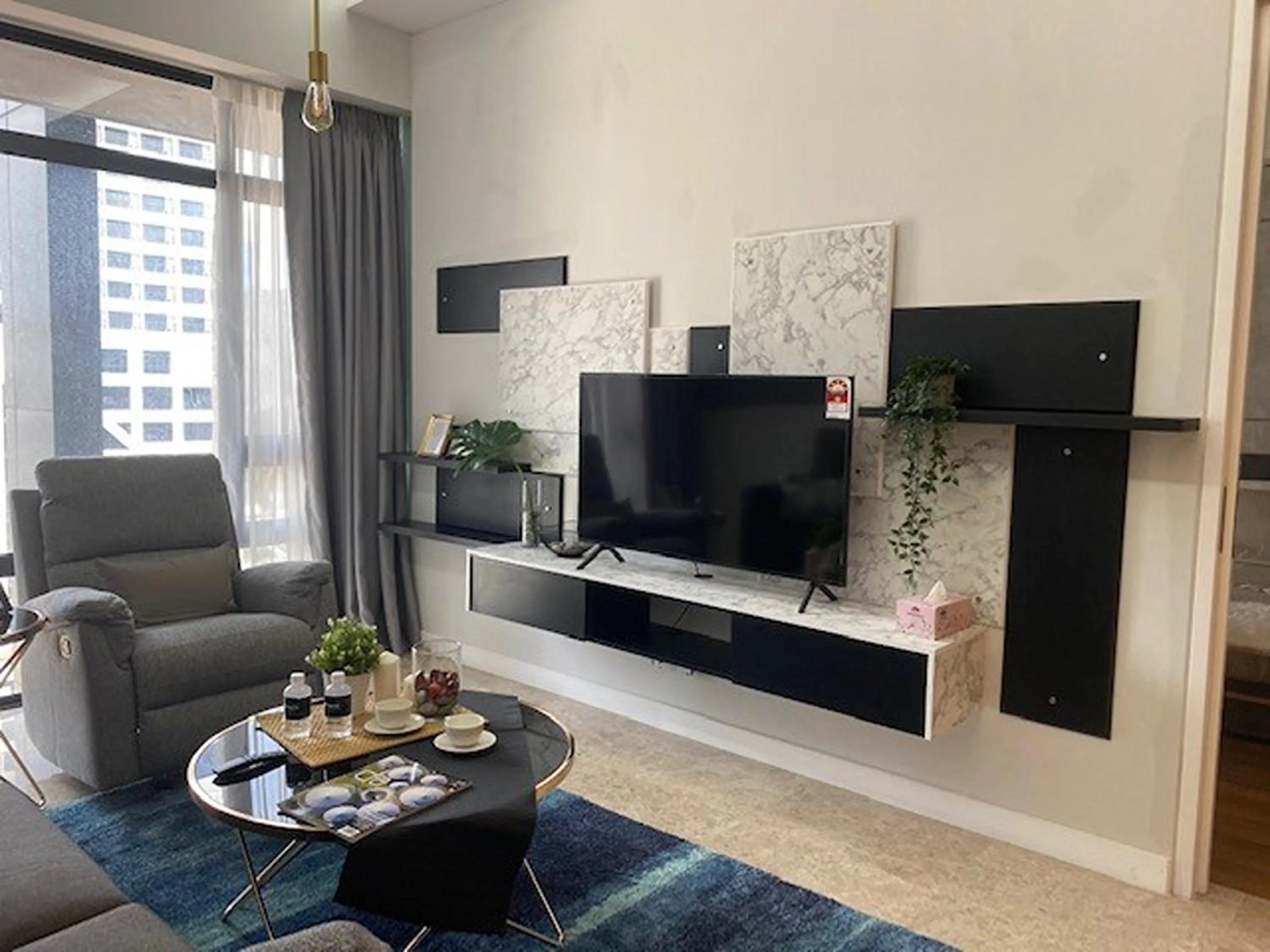 TV and multimedia in Leo Guesthouse at Anggun Residence Suite