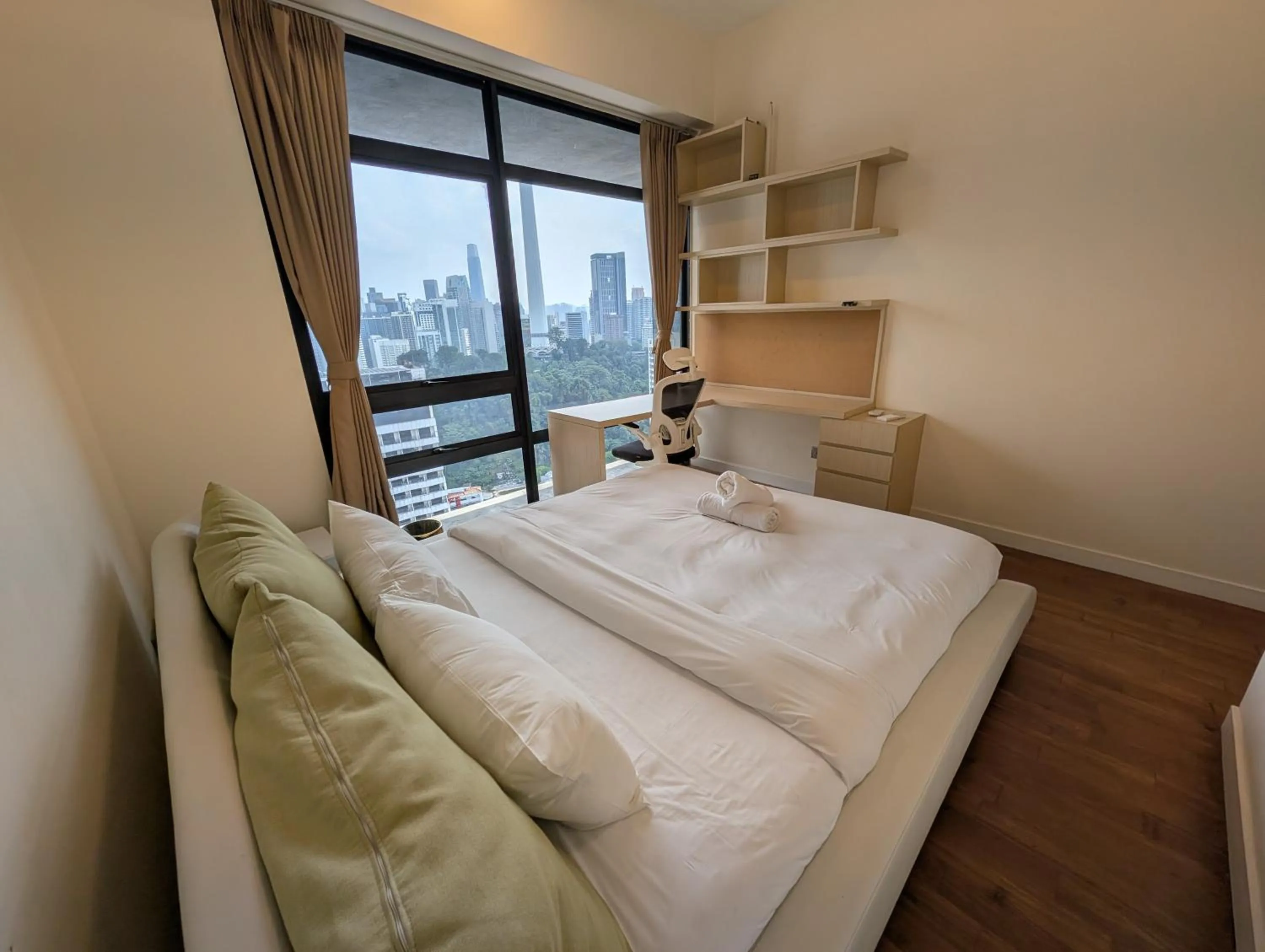 Bed in Leo Guesthouse at Anggun Residence Suite