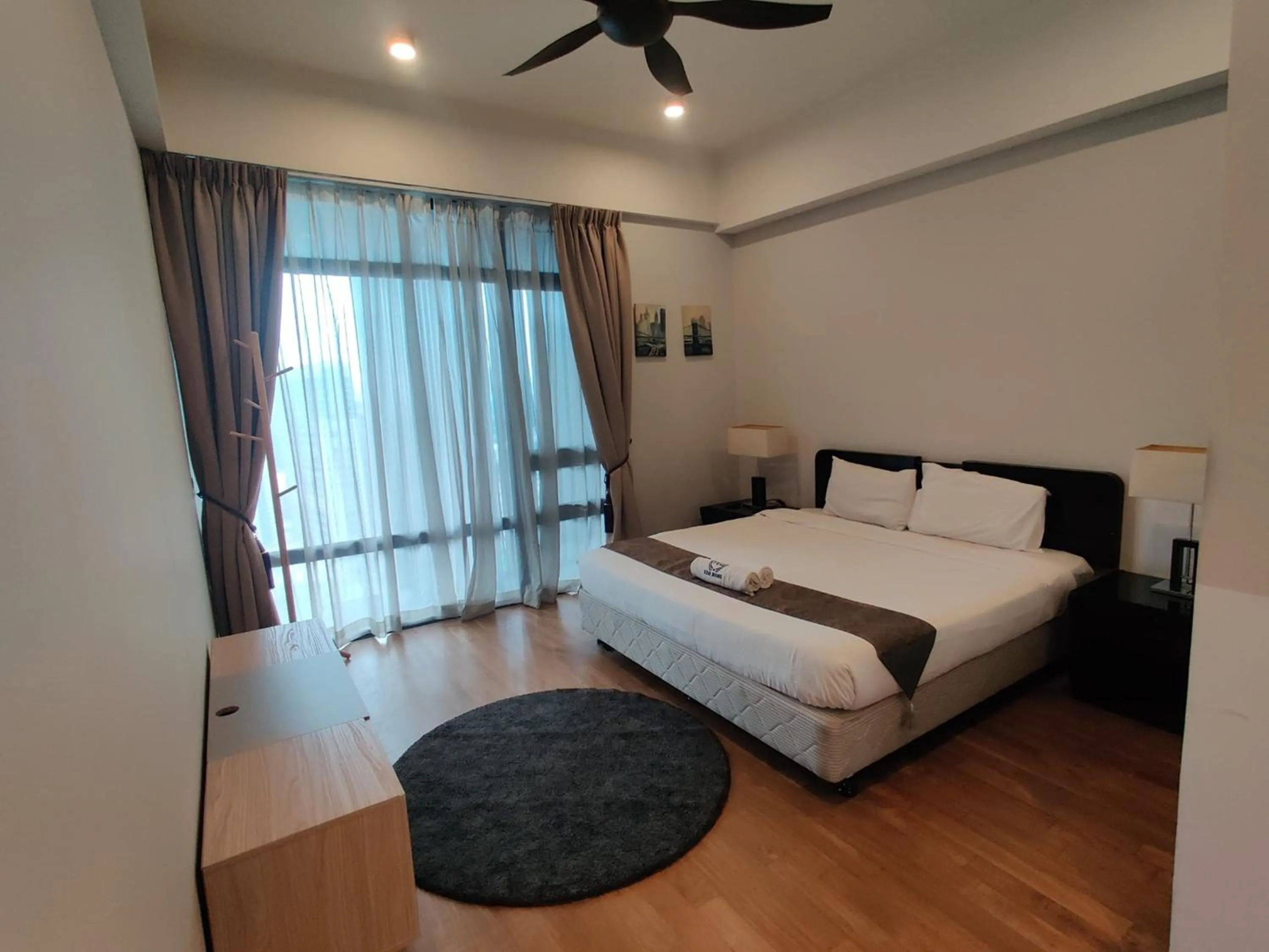 Bed in Leo Guesthouse at Anggun Residence Suite