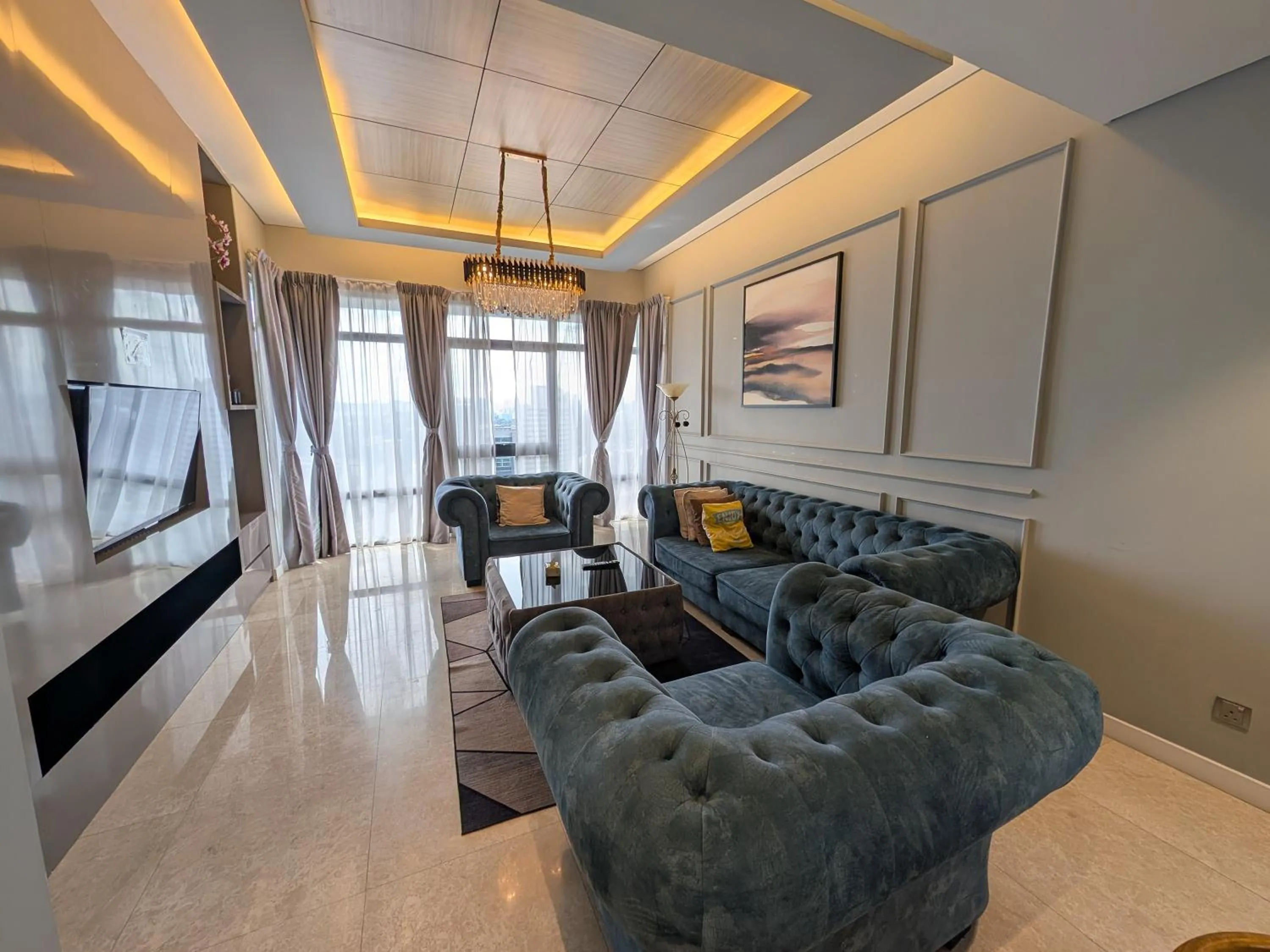 Seating area in Leo Guesthouse at Anggun Residence Suite