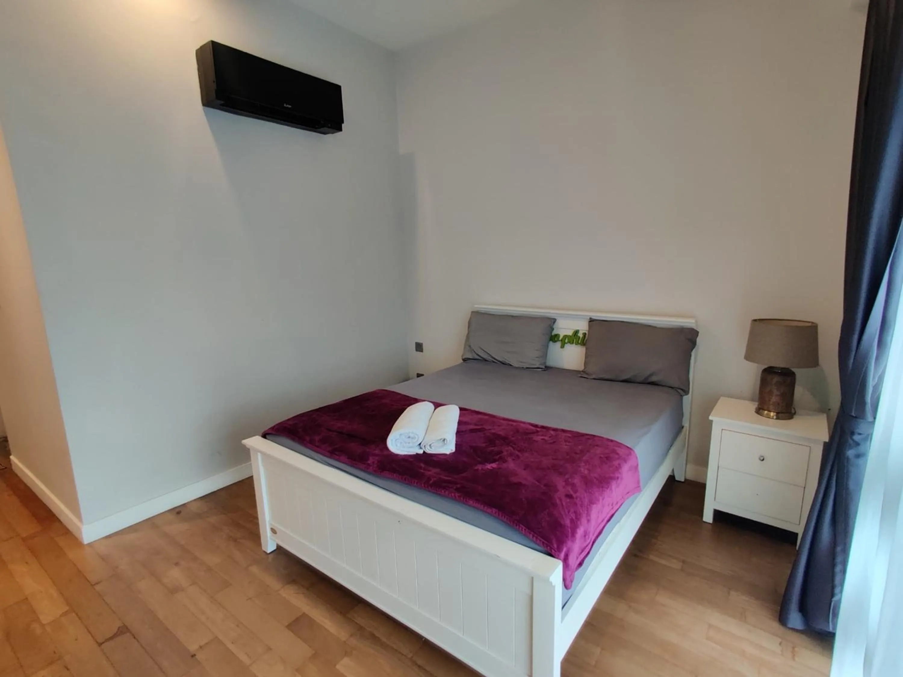 Bed in Leo Guesthouse at Anggun Residence Suite