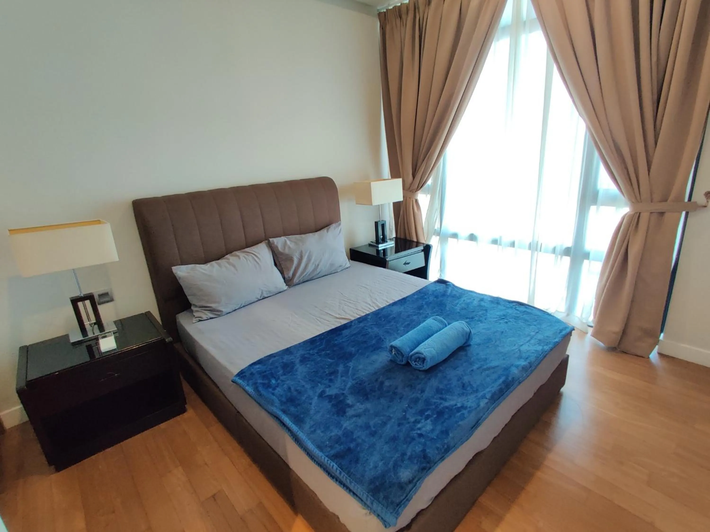 Bed in Leo Guesthouse at Anggun Residence Suite
