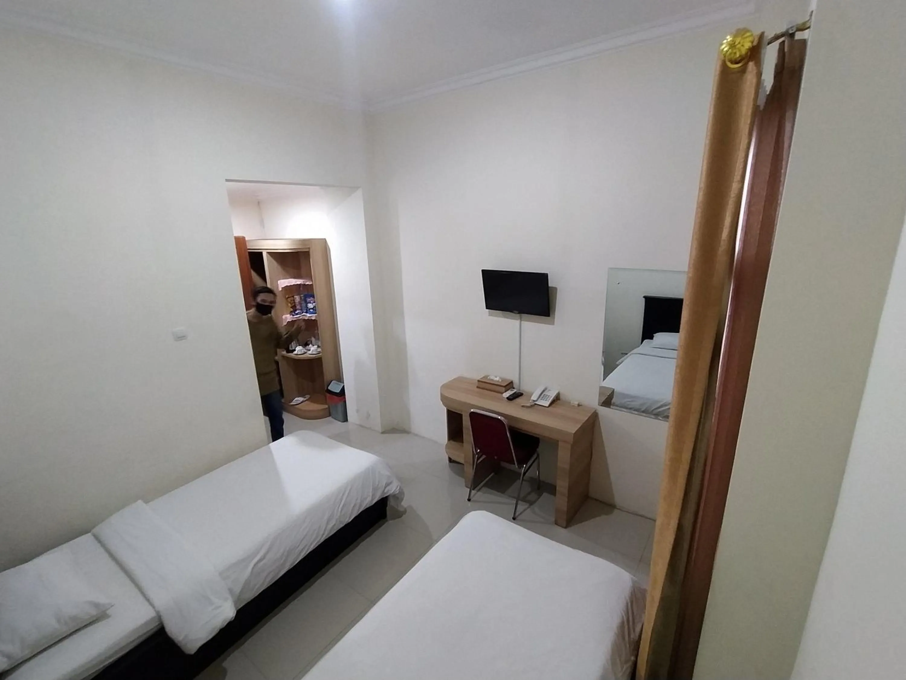 Bedroom, Bed in Hotel Prasasti Pacitan