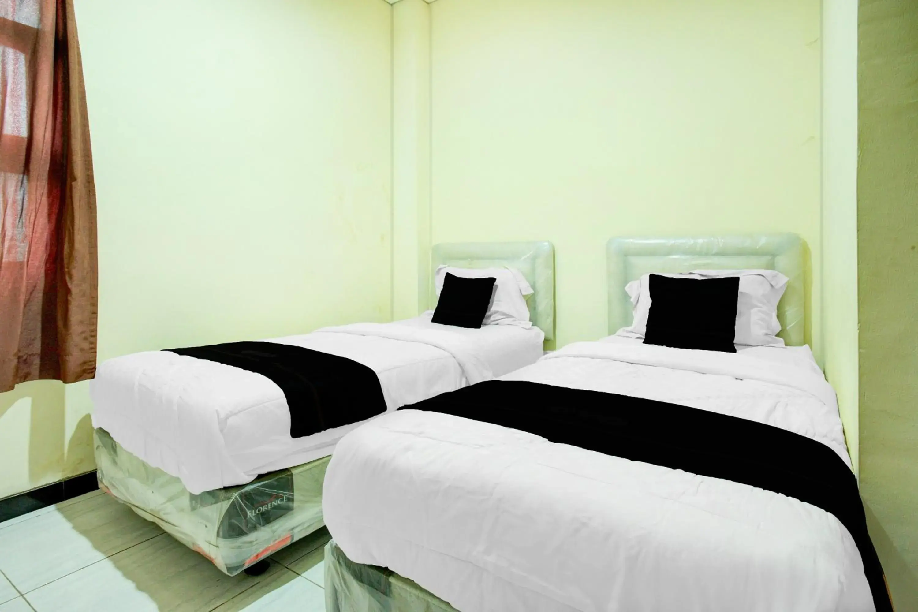 Standard Twin Room in Hotel O Palembang near Palembang City Center Mall formerly Kostel 97 Standard Twin Room in Hotel O Palembang near Palembang City Center Mall formerly Kostel 97