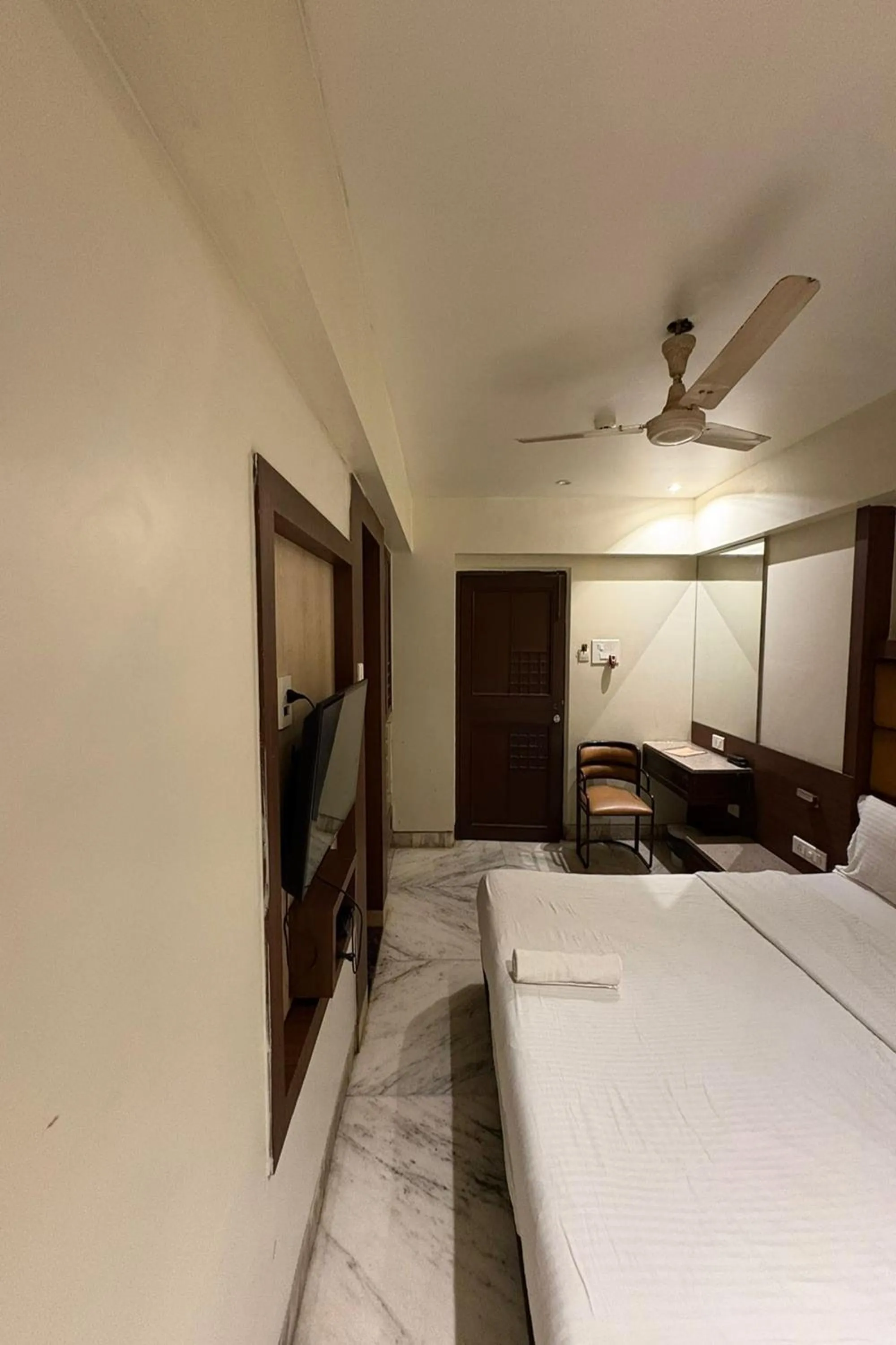 Bed in Pravasi Residency