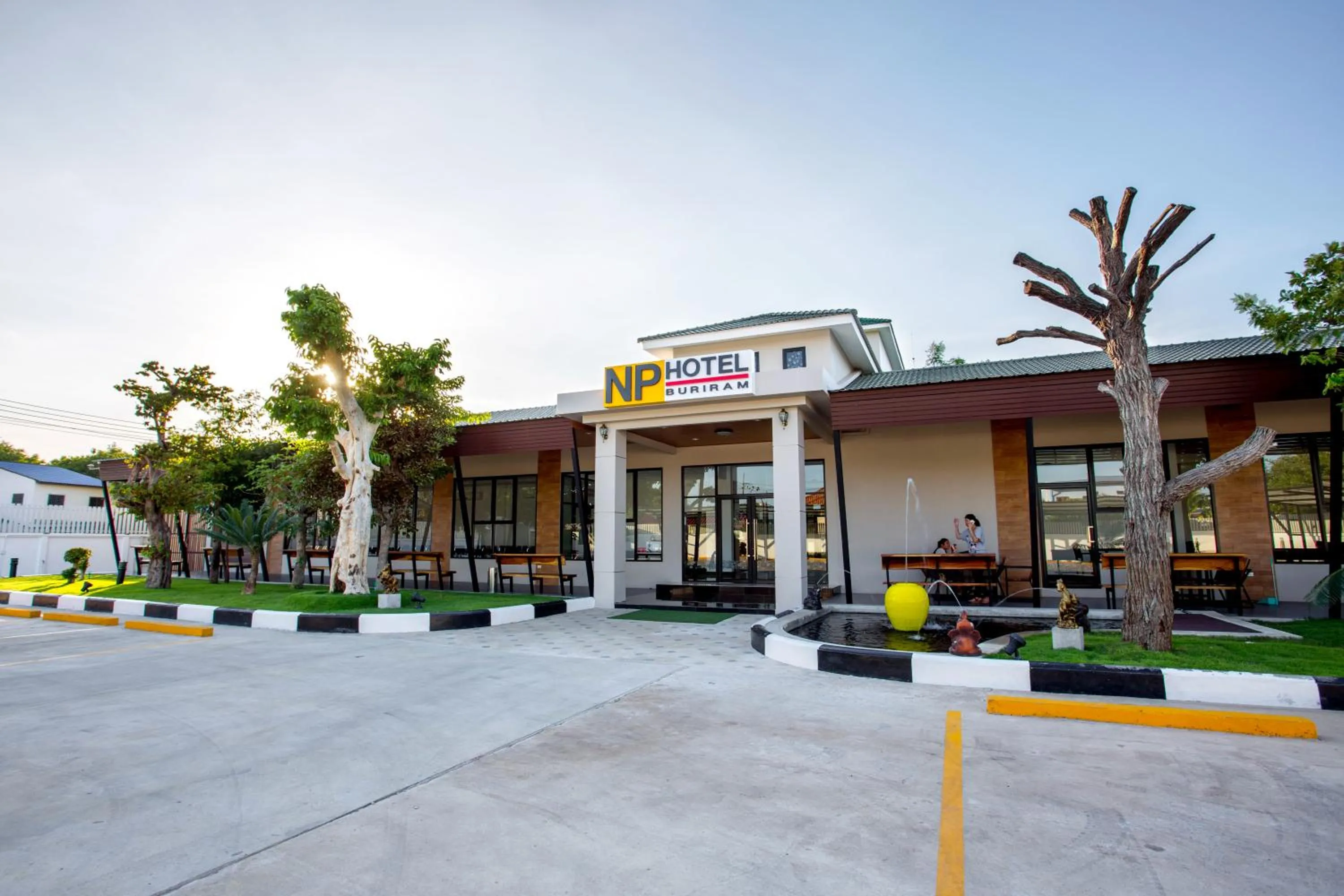 Property logo or sign in NP Hotel