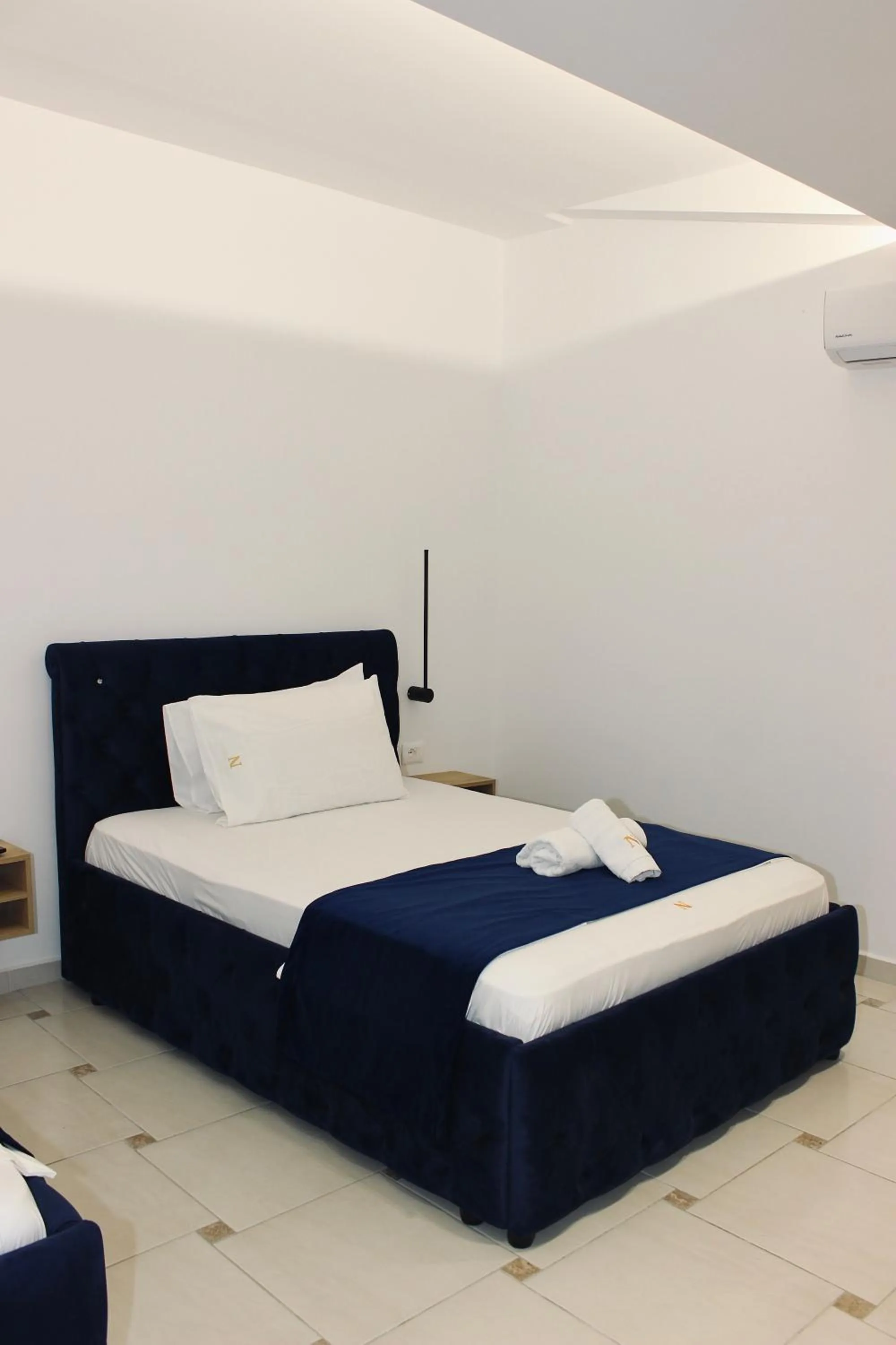 Bed in Qeparo Napolon Complex