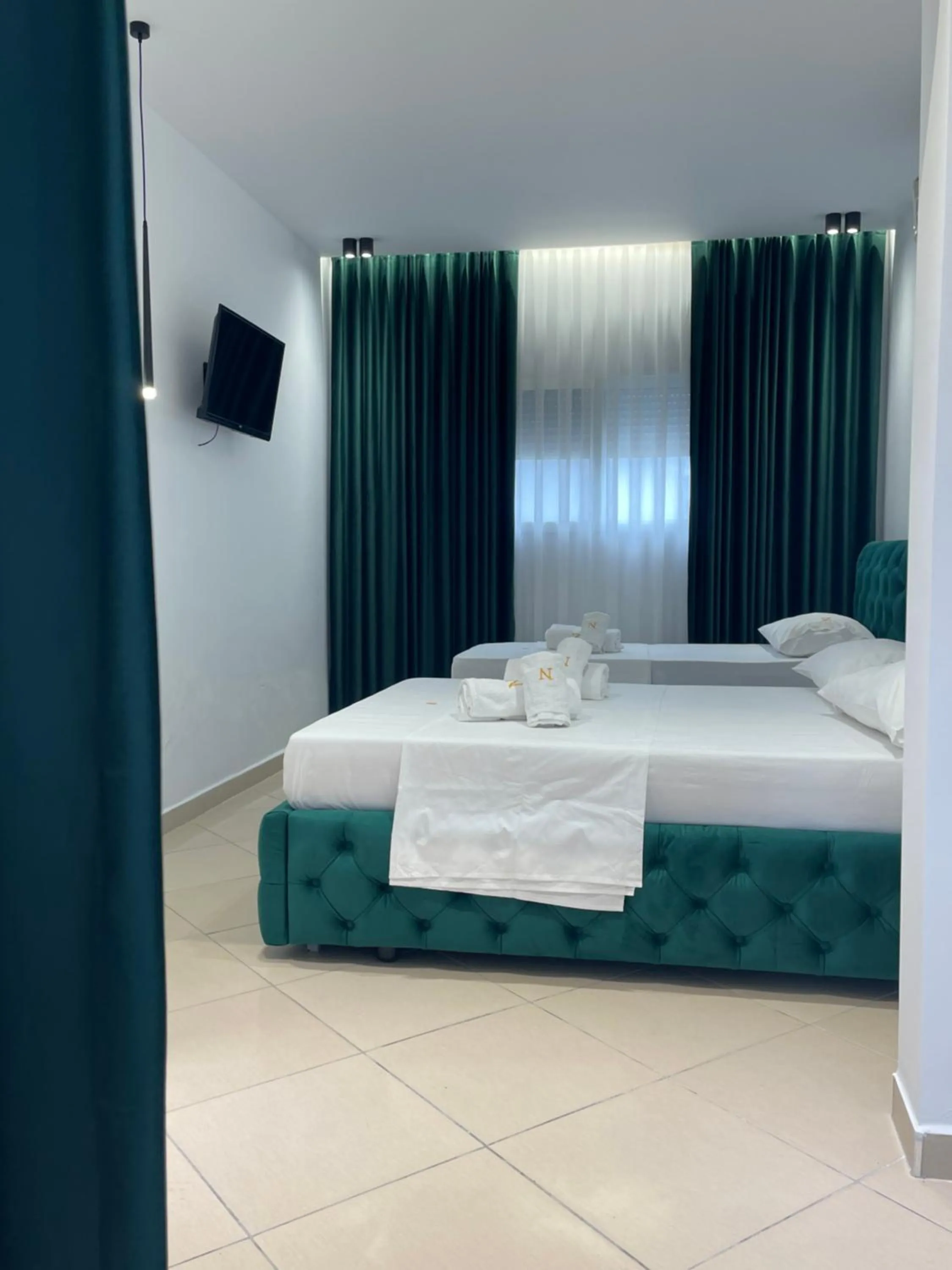 Bed in Qeparo Napolon Complex