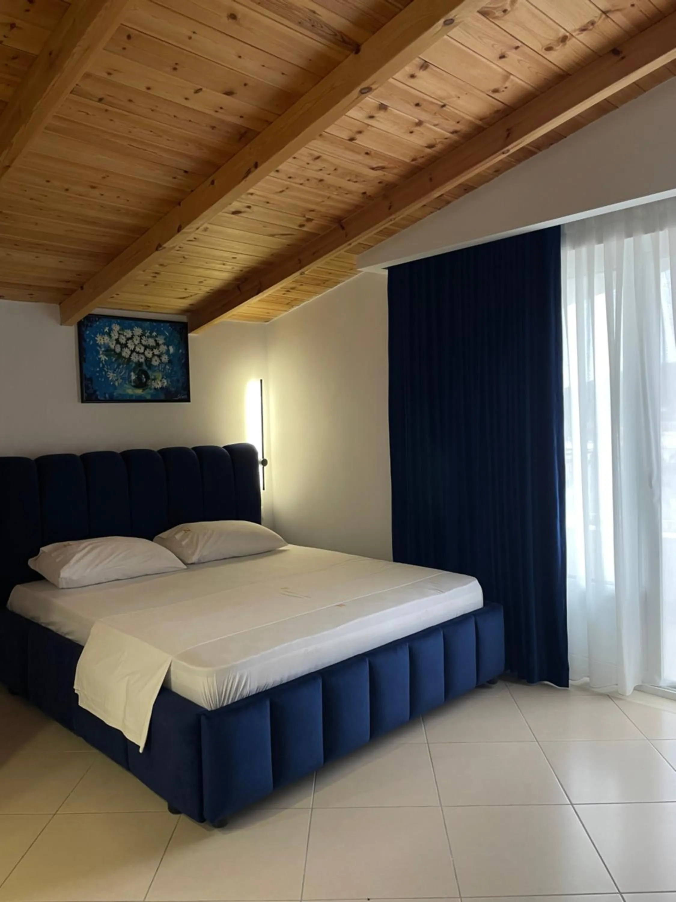 Photo of the whole room, Bed in Qeparo Napolon Complex