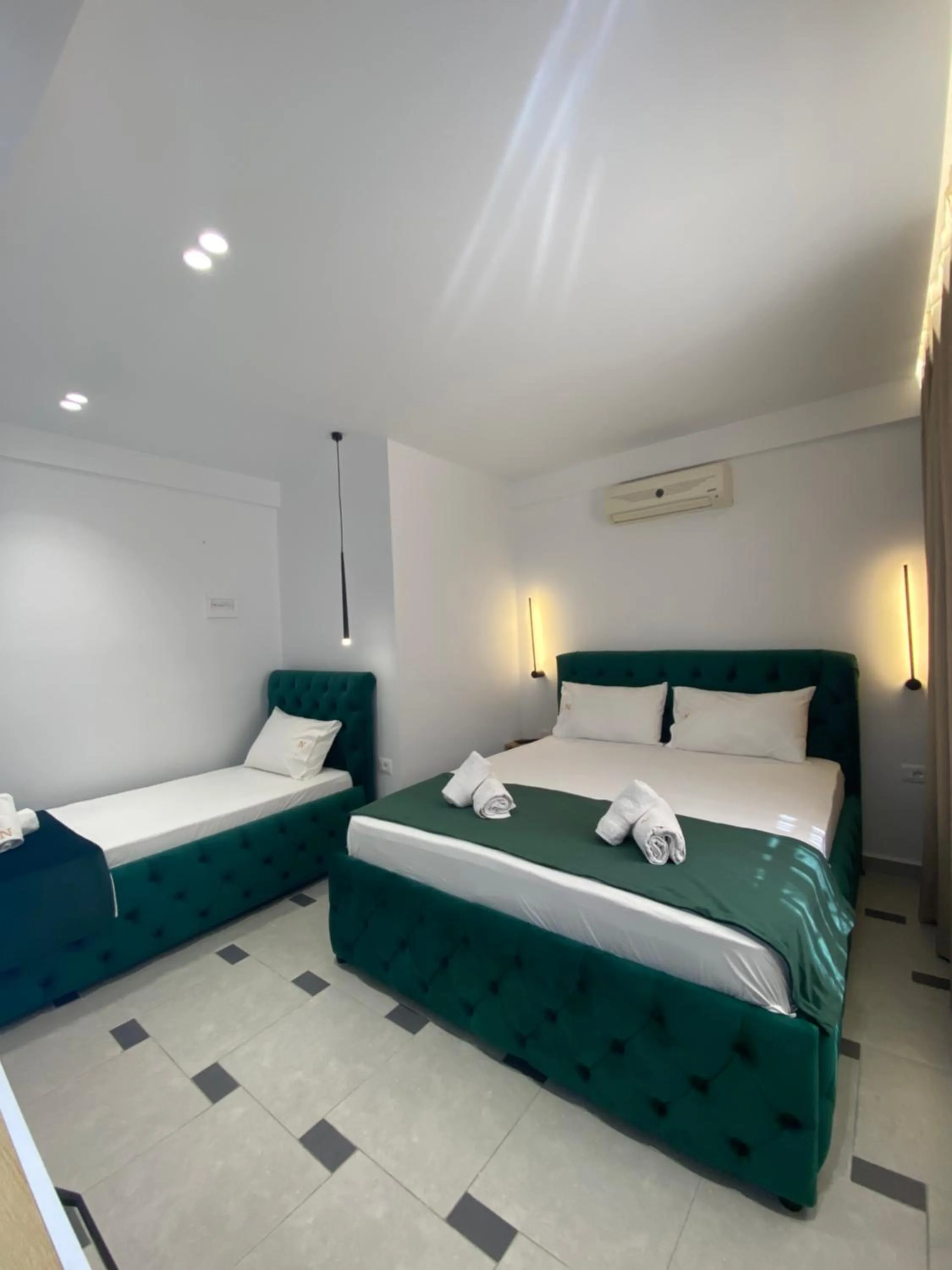 Bed in Qeparo Napolon Complex