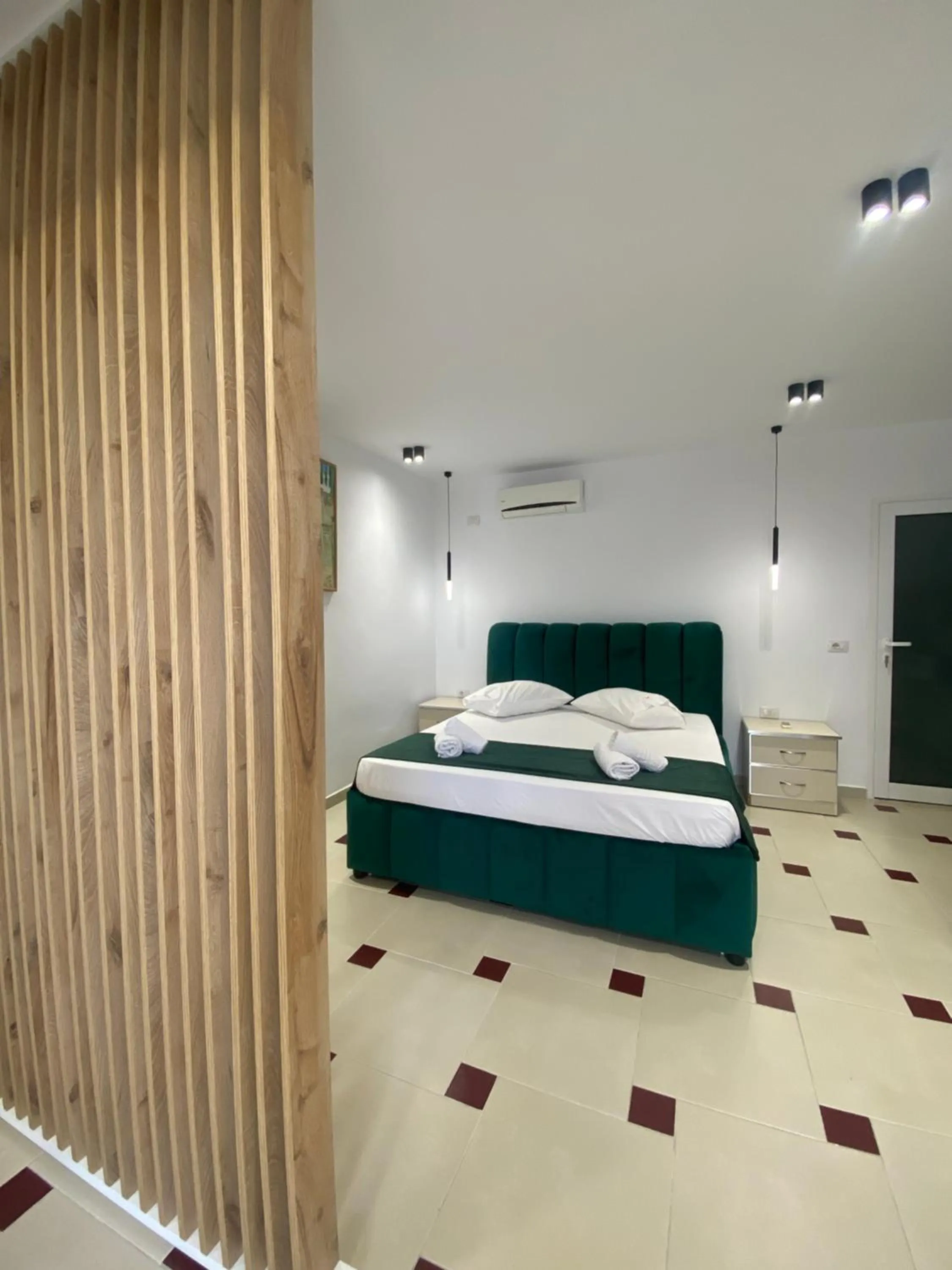 Bed in Qeparo Napolon Complex