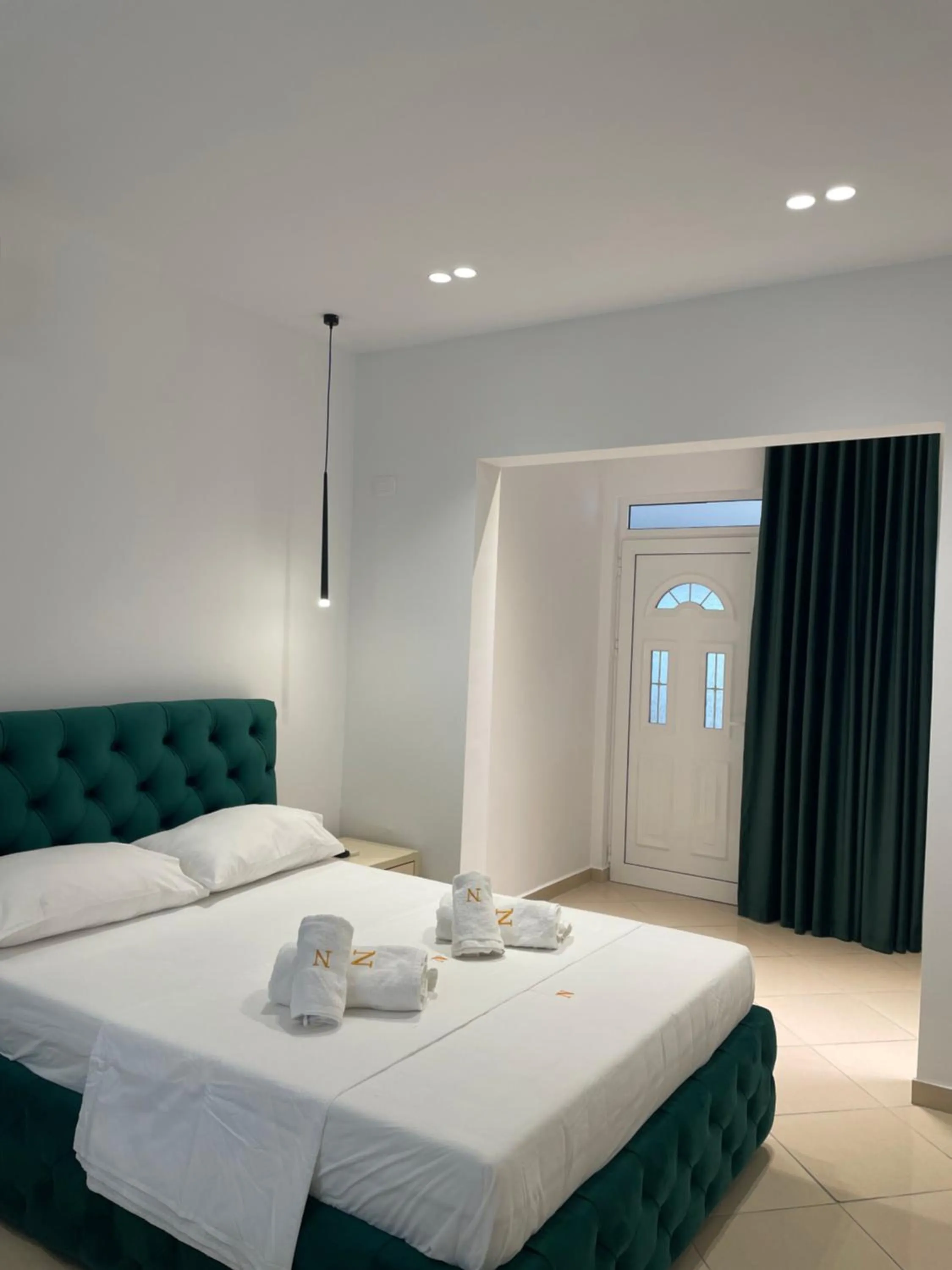 Bed in Qeparo Napolon Complex