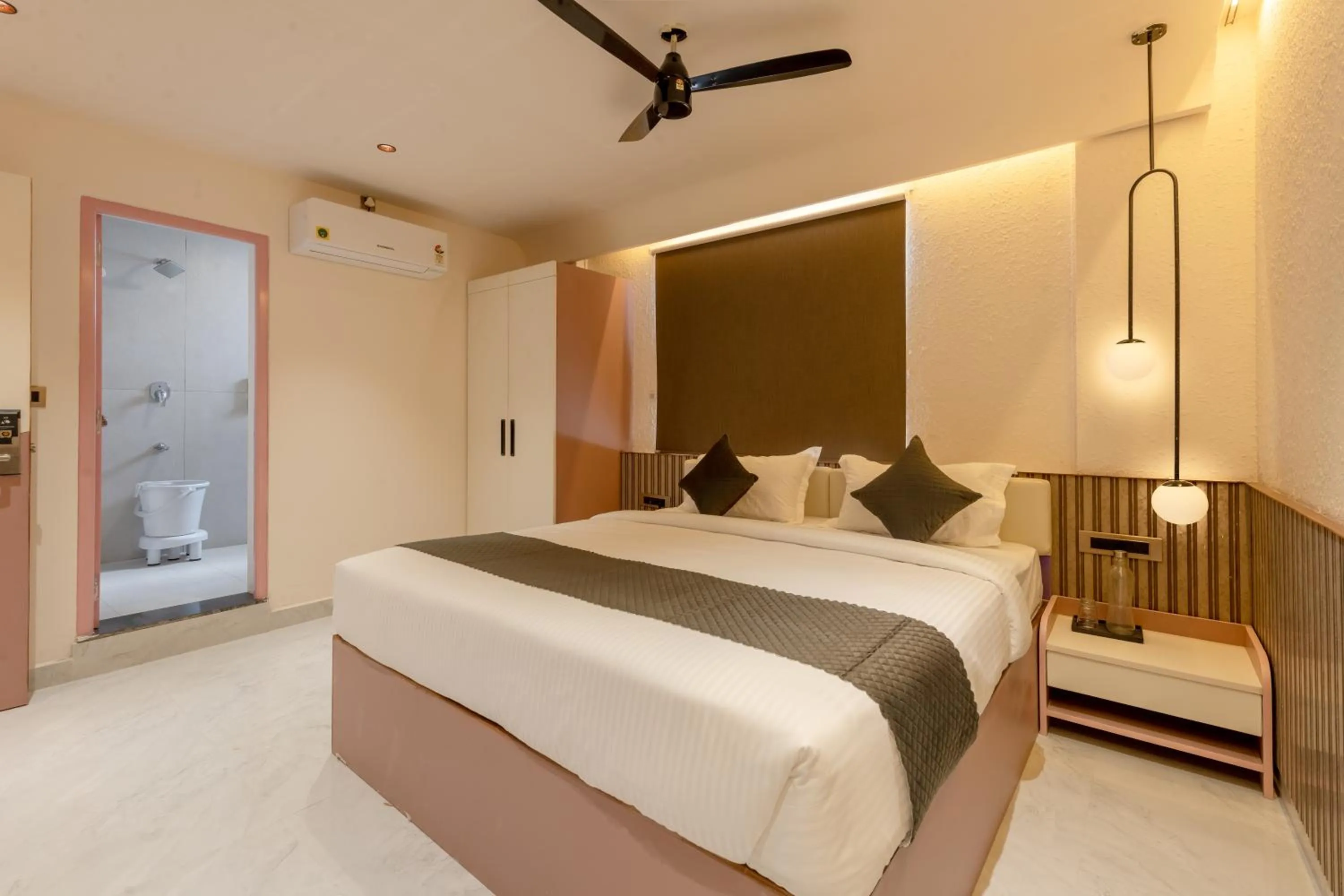 Photo of the whole room, Bed in Legacy Inn, Mysore