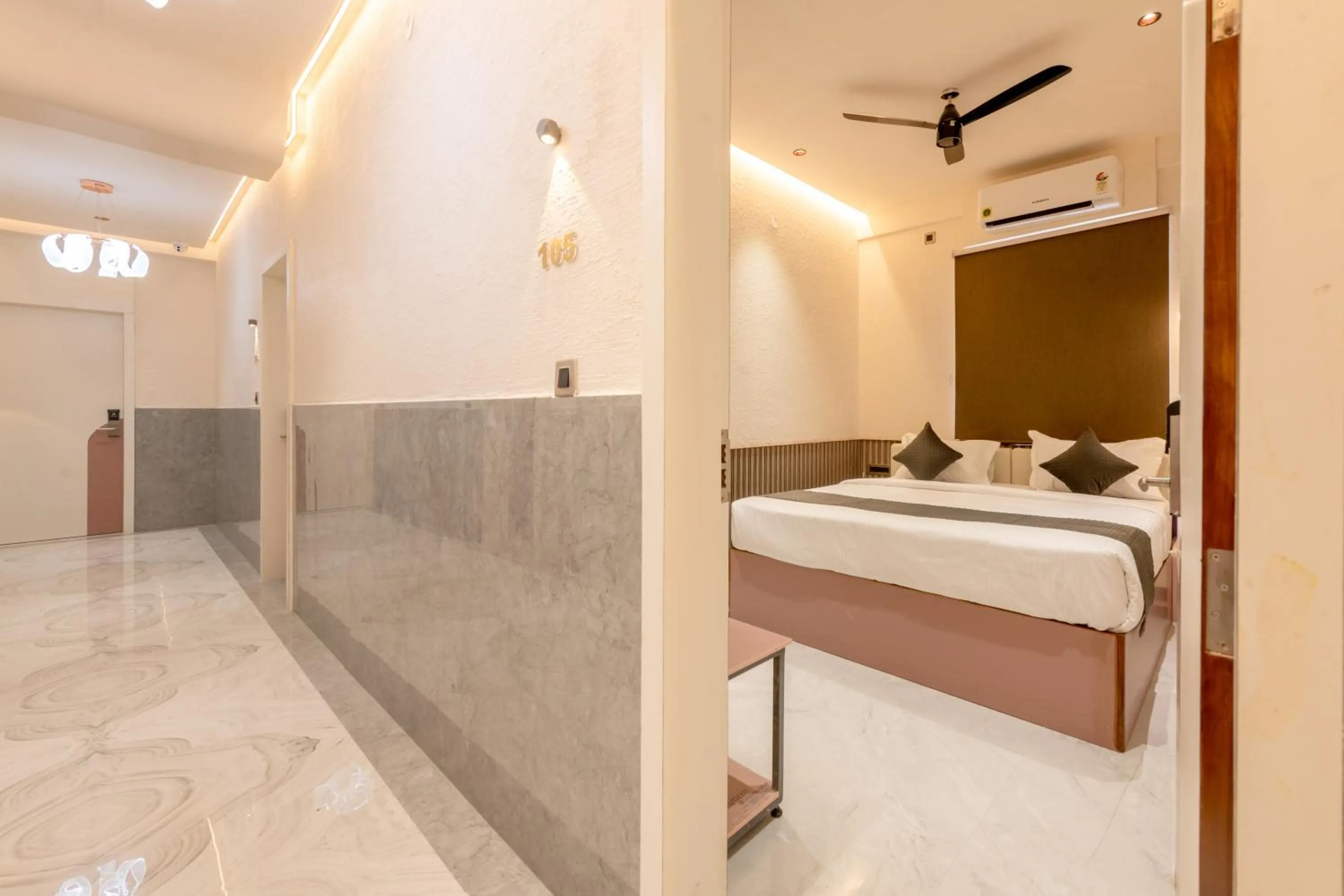 Photo of the whole room, Bed in Legacy Inn, Mysore