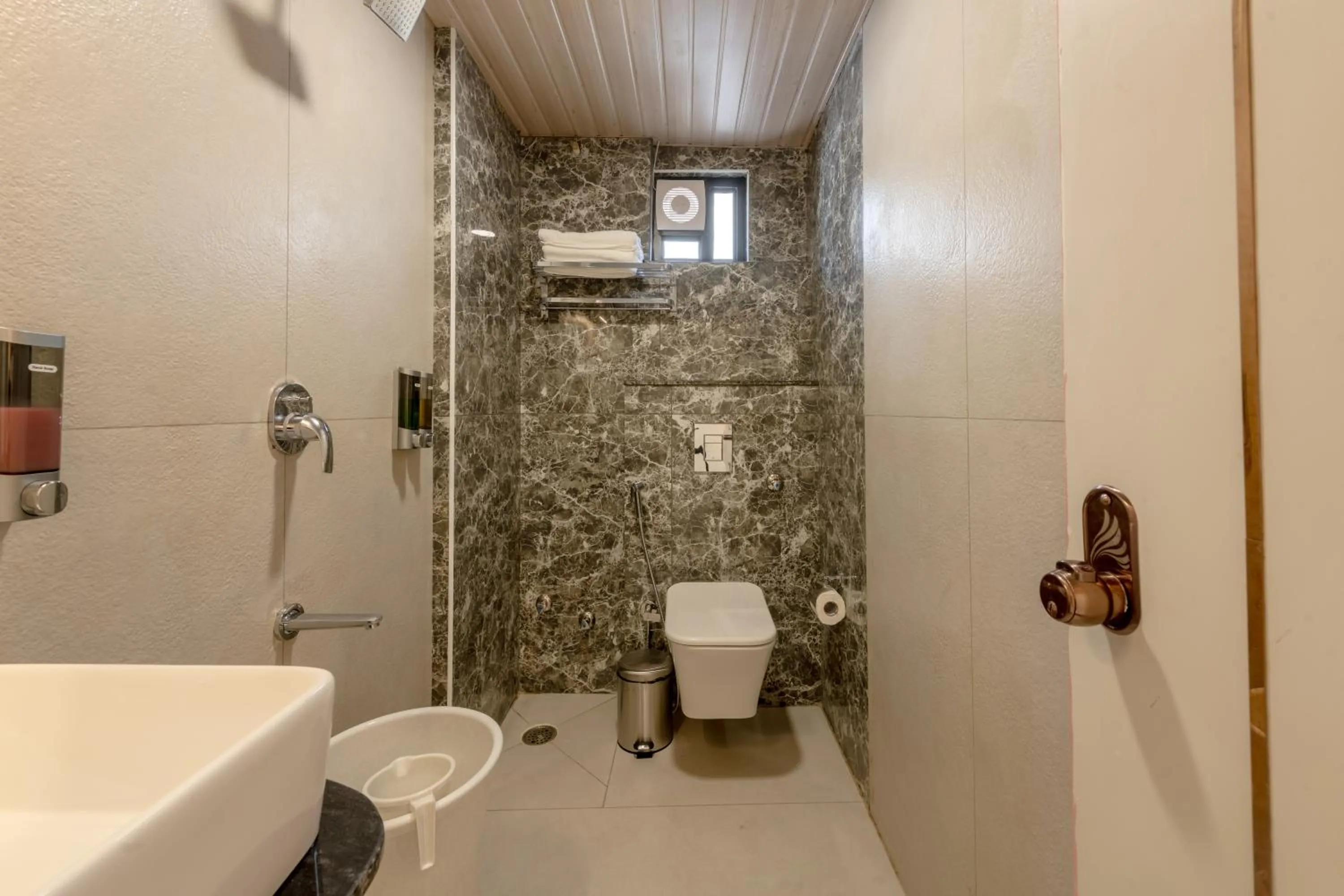 Bathroom in Legacy Inn, Mysore