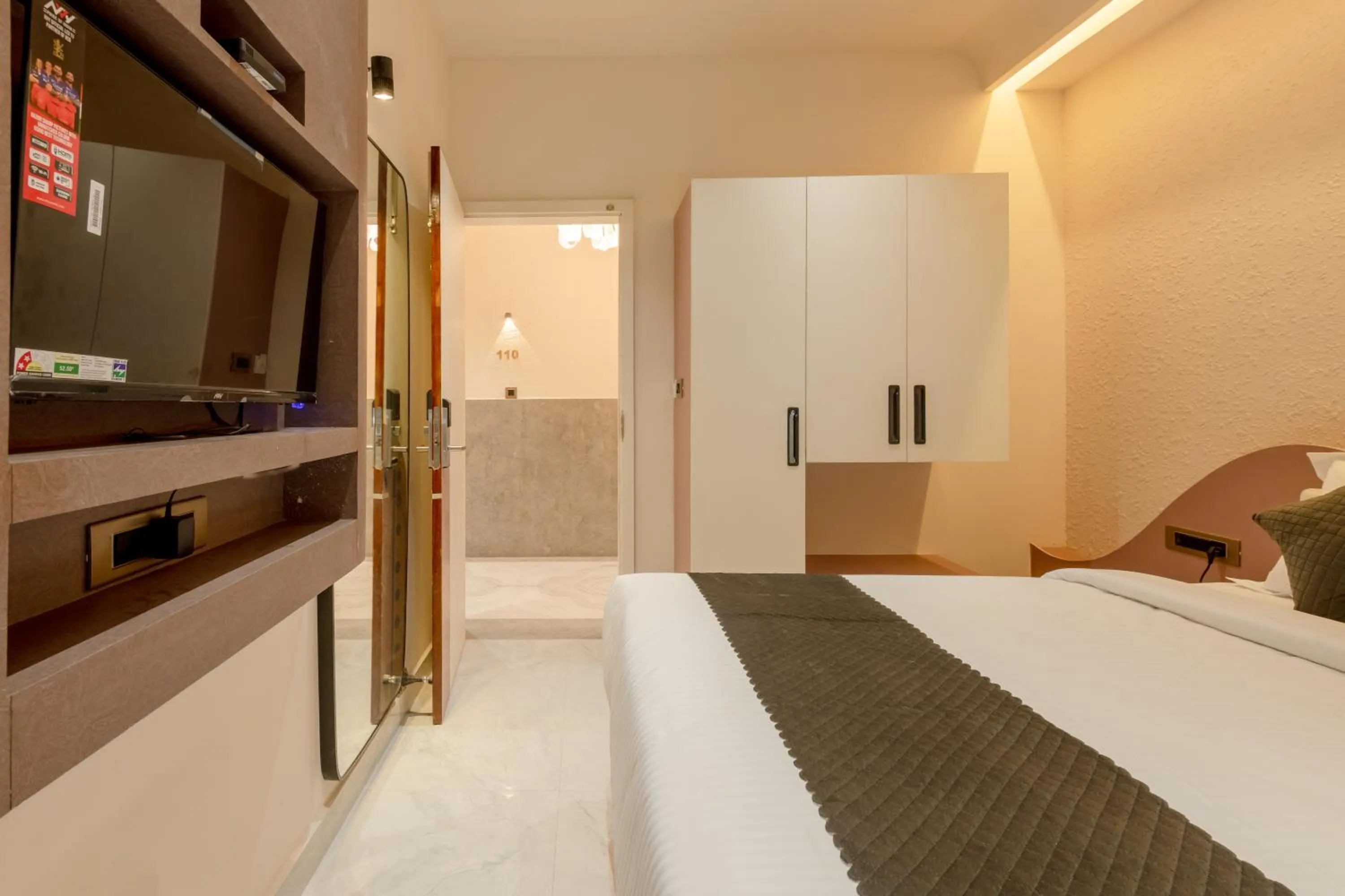 Photo of the whole room, Bed in Legacy Inn, Mysore