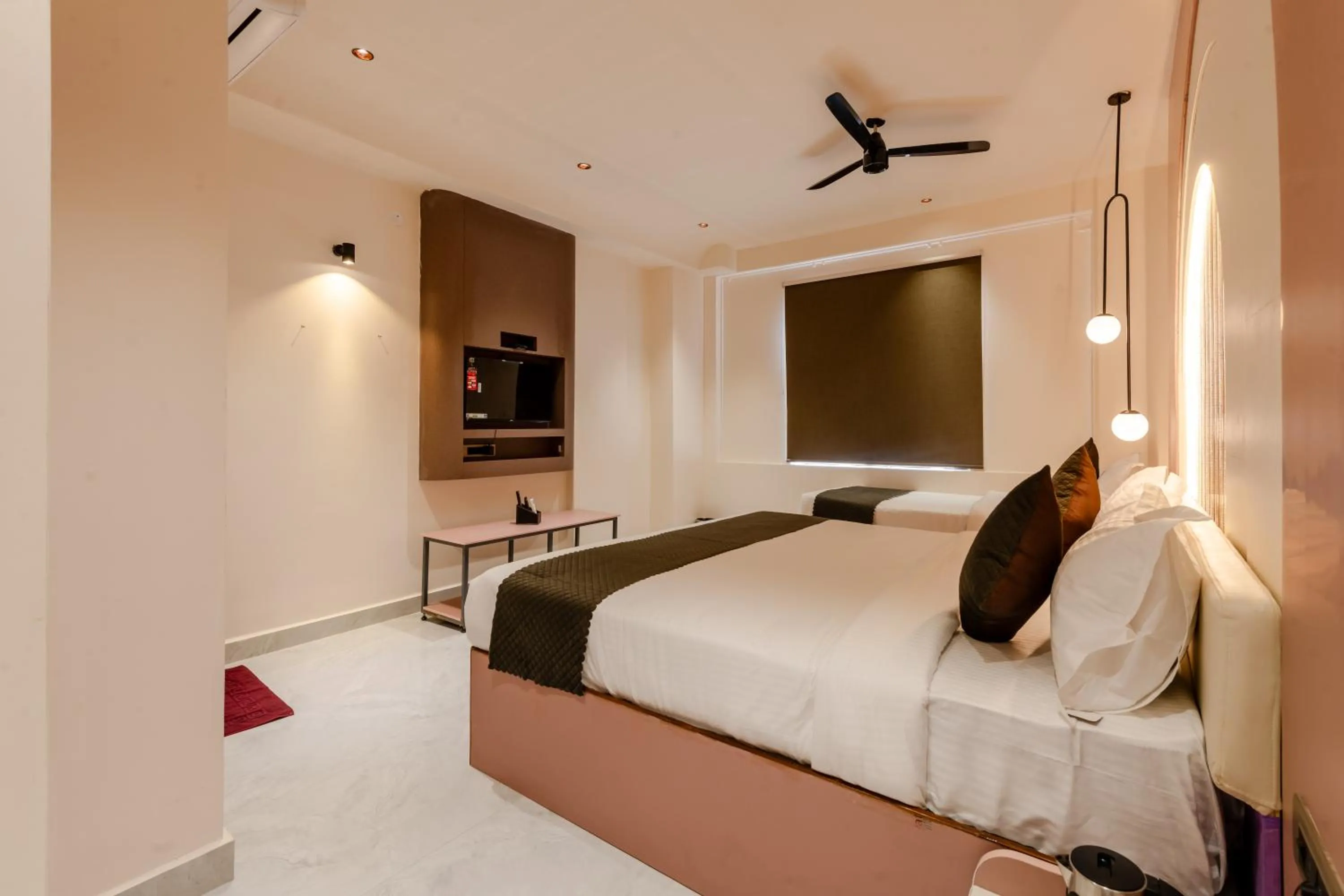 Photo of the whole room, Bed in Legacy Inn, Mysore