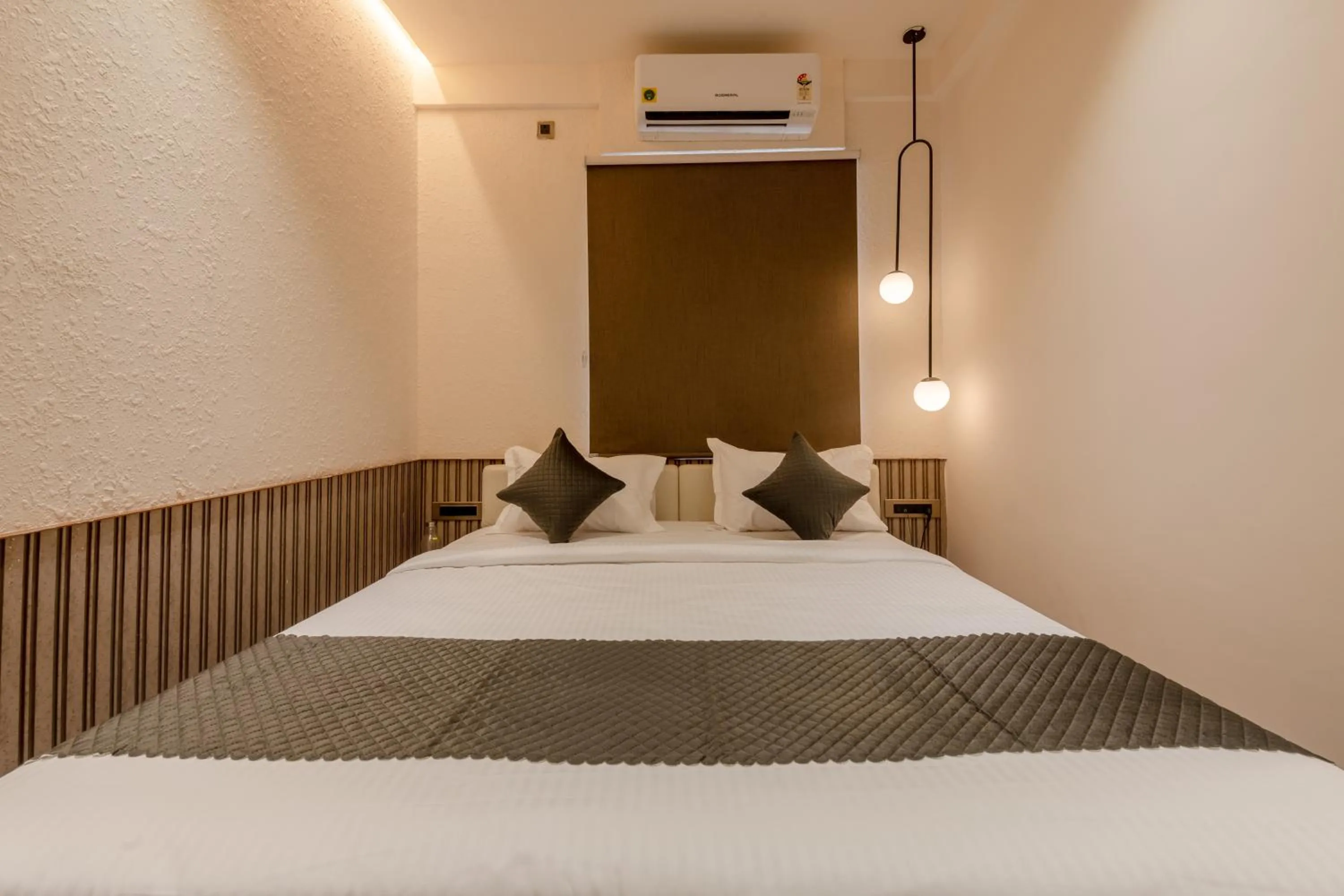 Bed in Legacy Inn, Mysore
