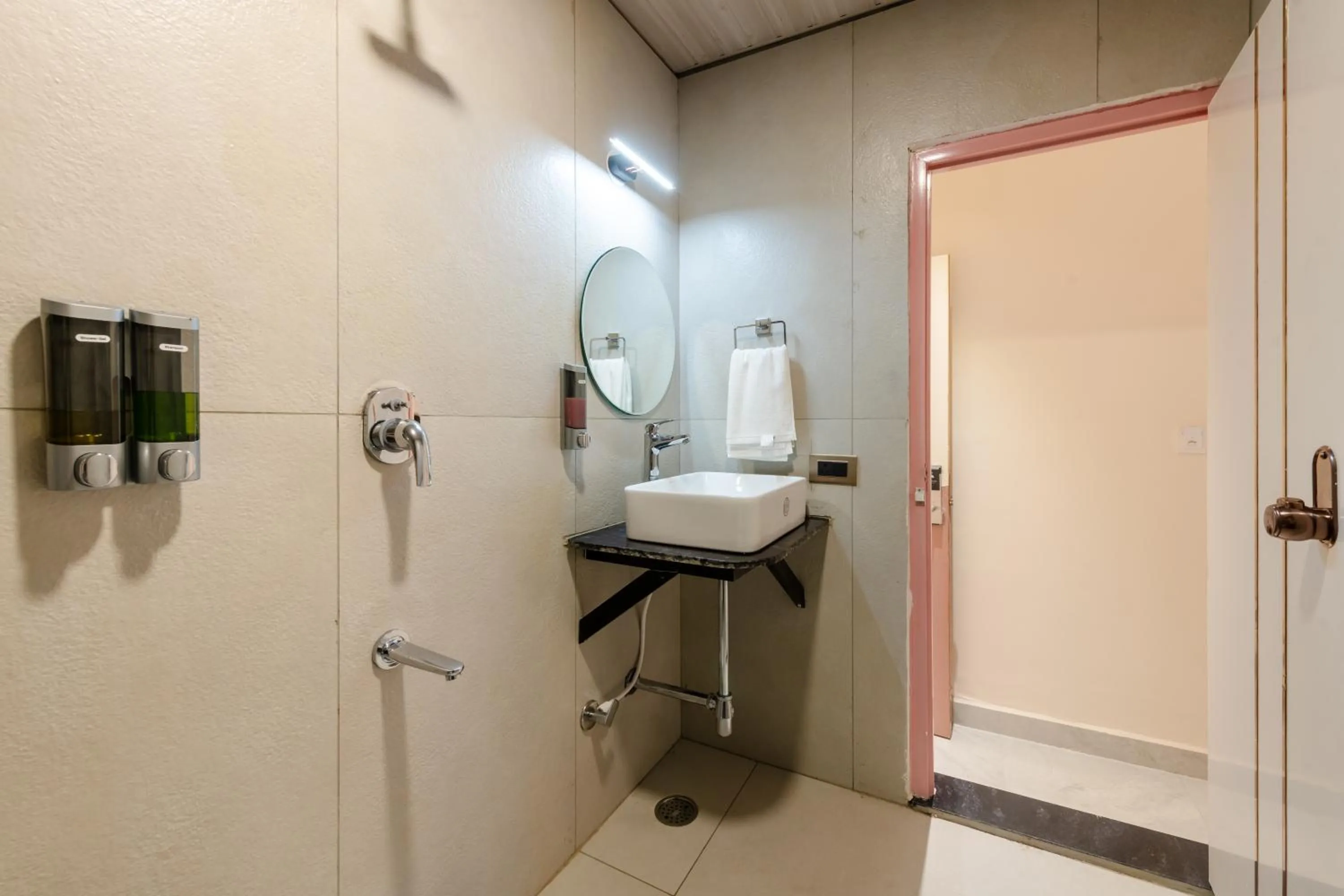 Bathroom in Legacy Inn, Mysore