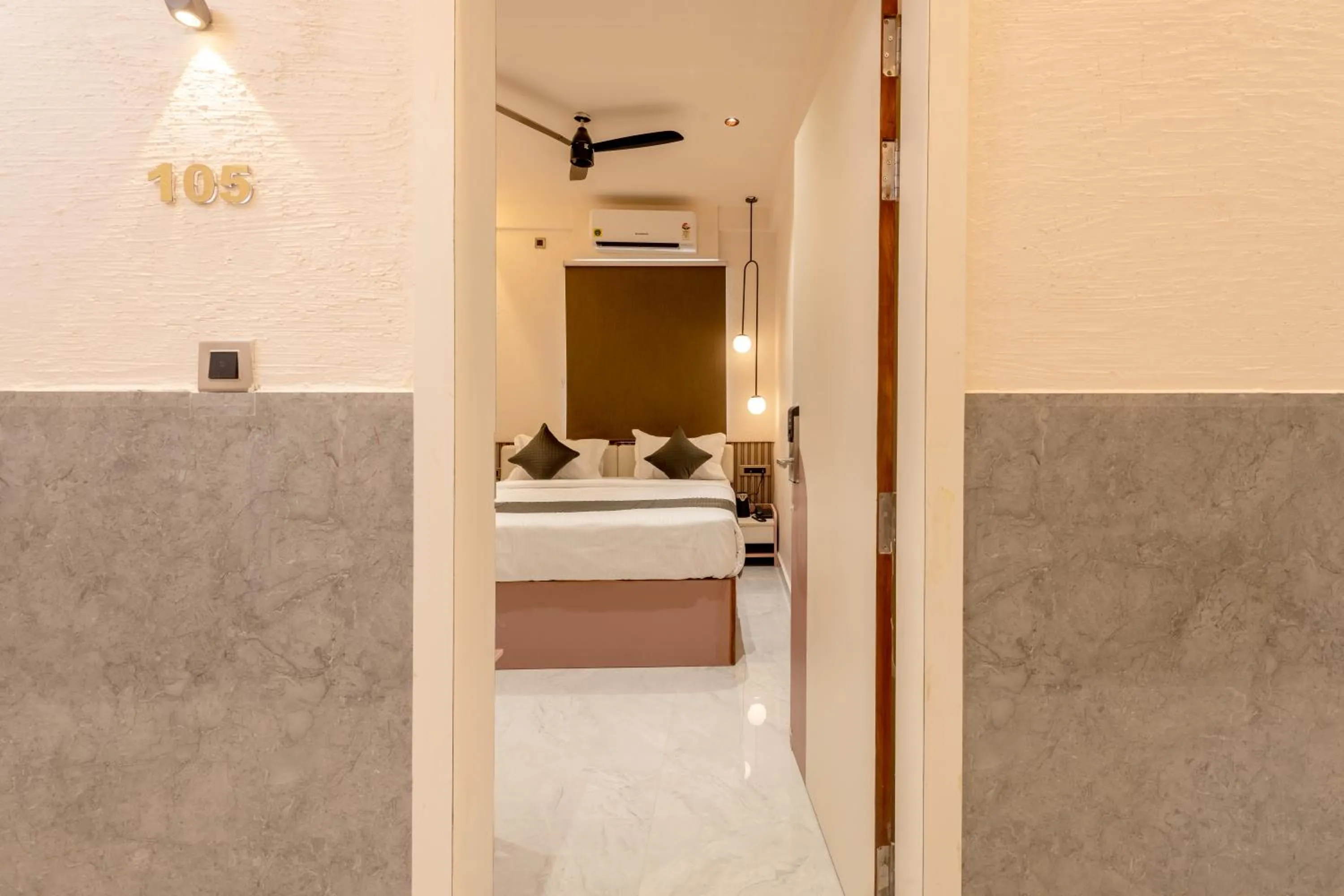 Photo of the whole room, Bed in Legacy Inn, Mysore